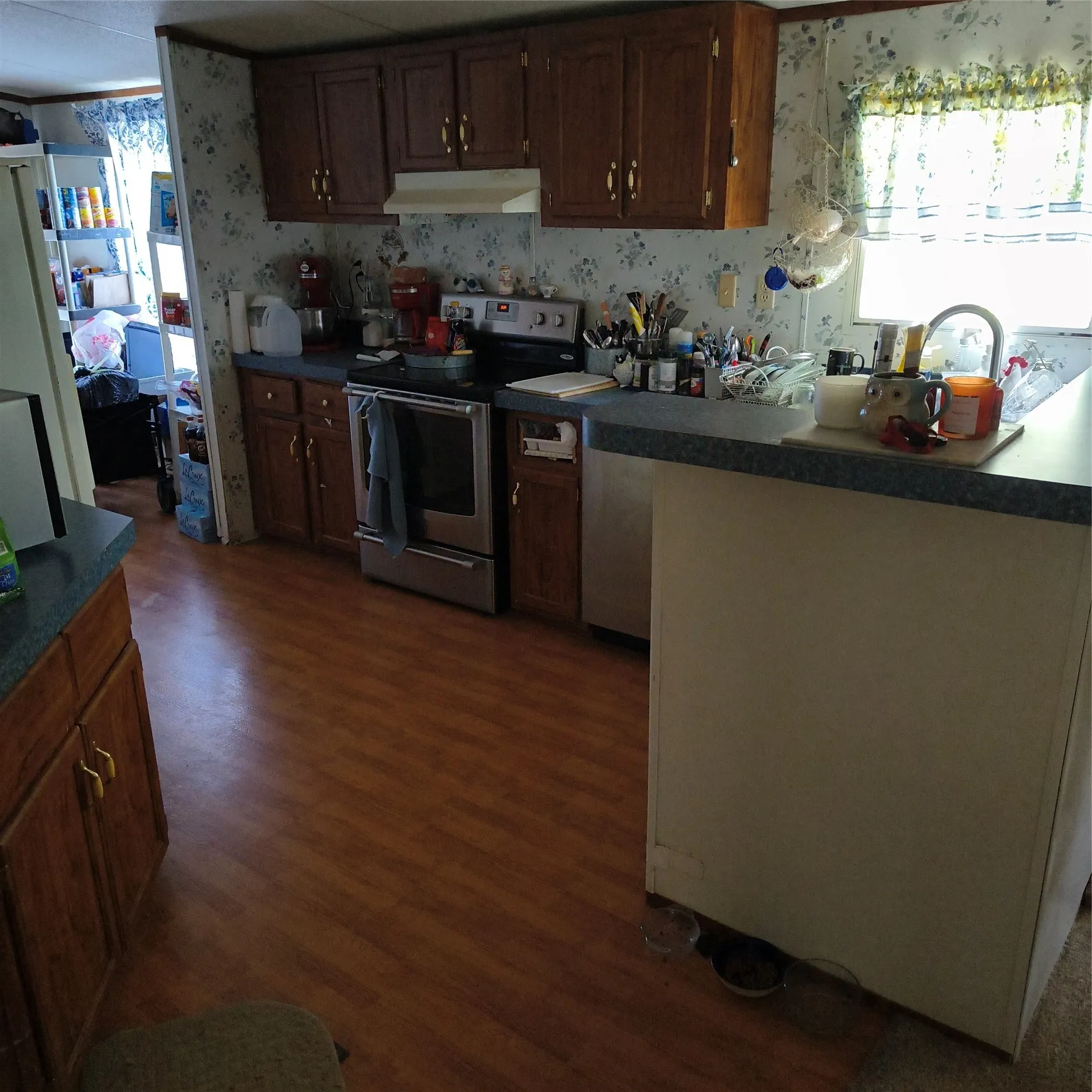 Wood-finish flooring throughout the kitchen