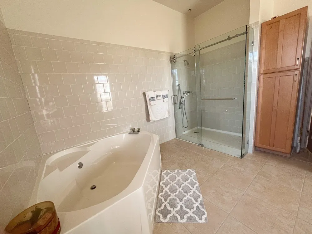 Primary with new glass enclosure doors