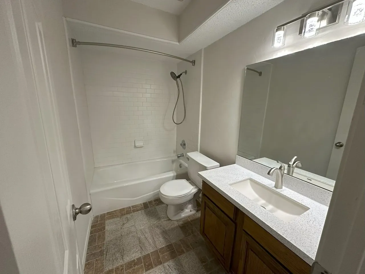 Just installed sink, faucet, counters & lighting.