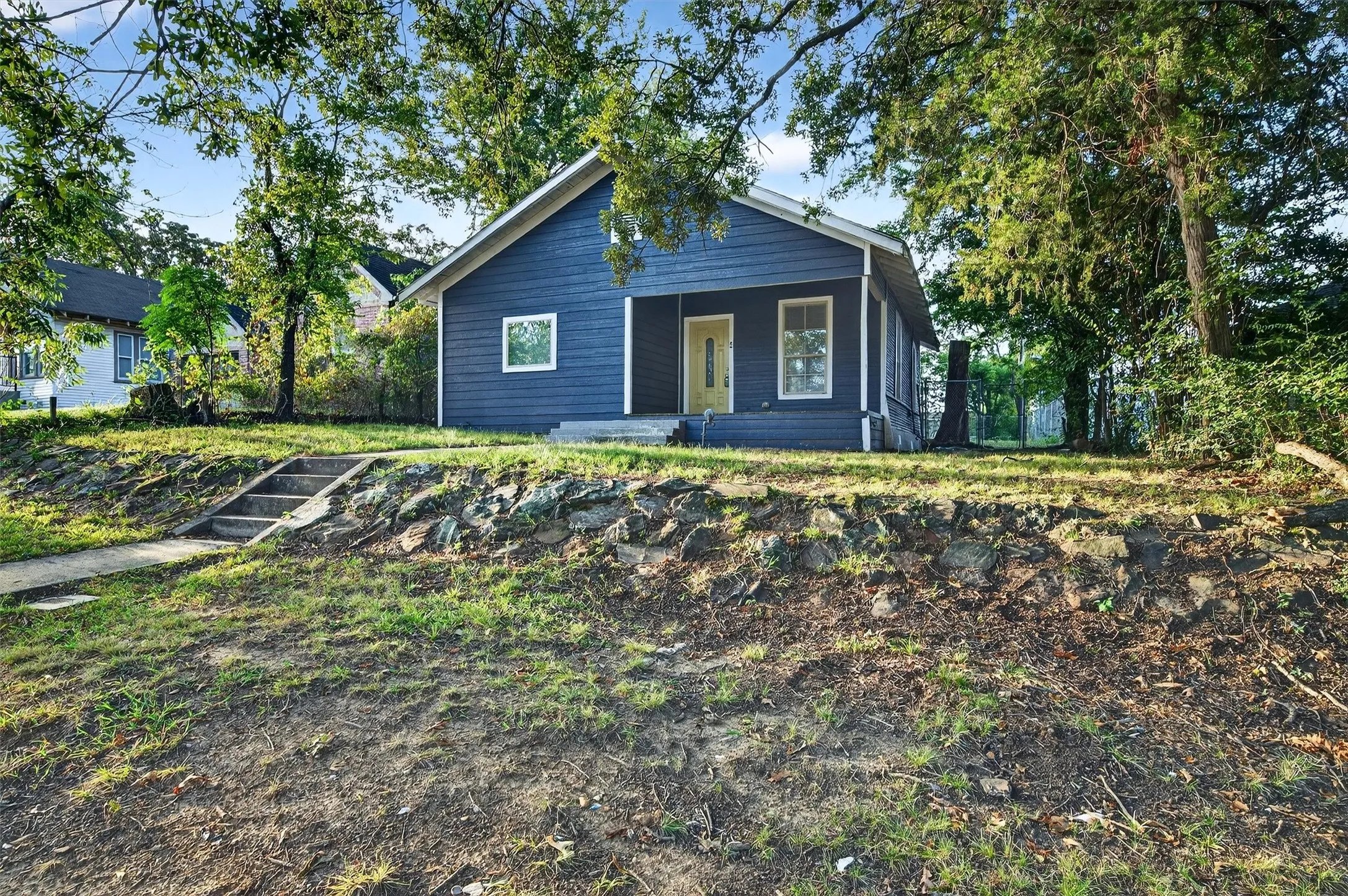 Bungalow-style home with a porch