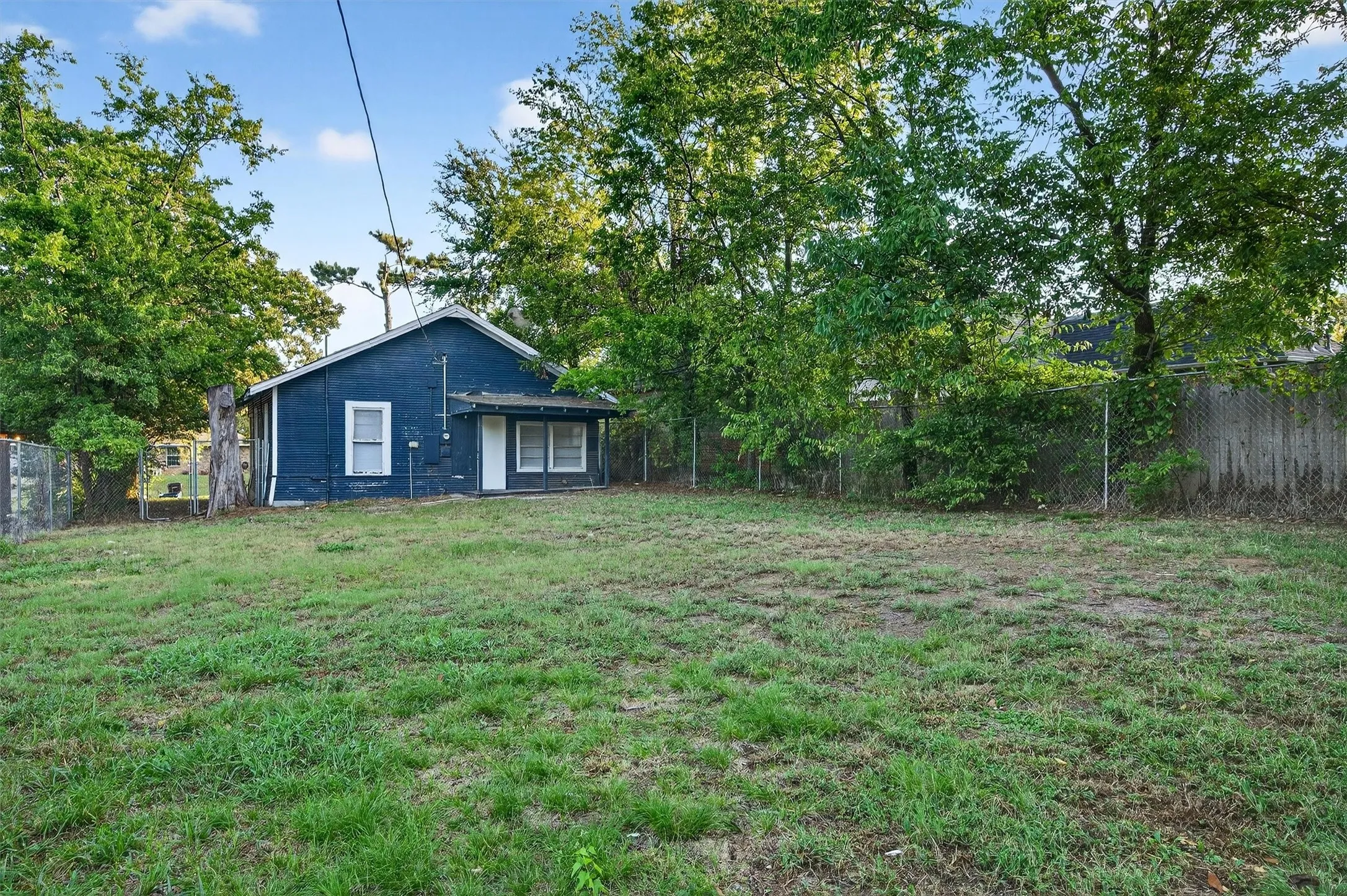 View of fenced backyard