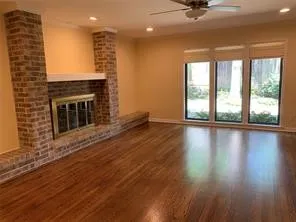 gleaming hardwoods hasten your steps to view this stunning property!