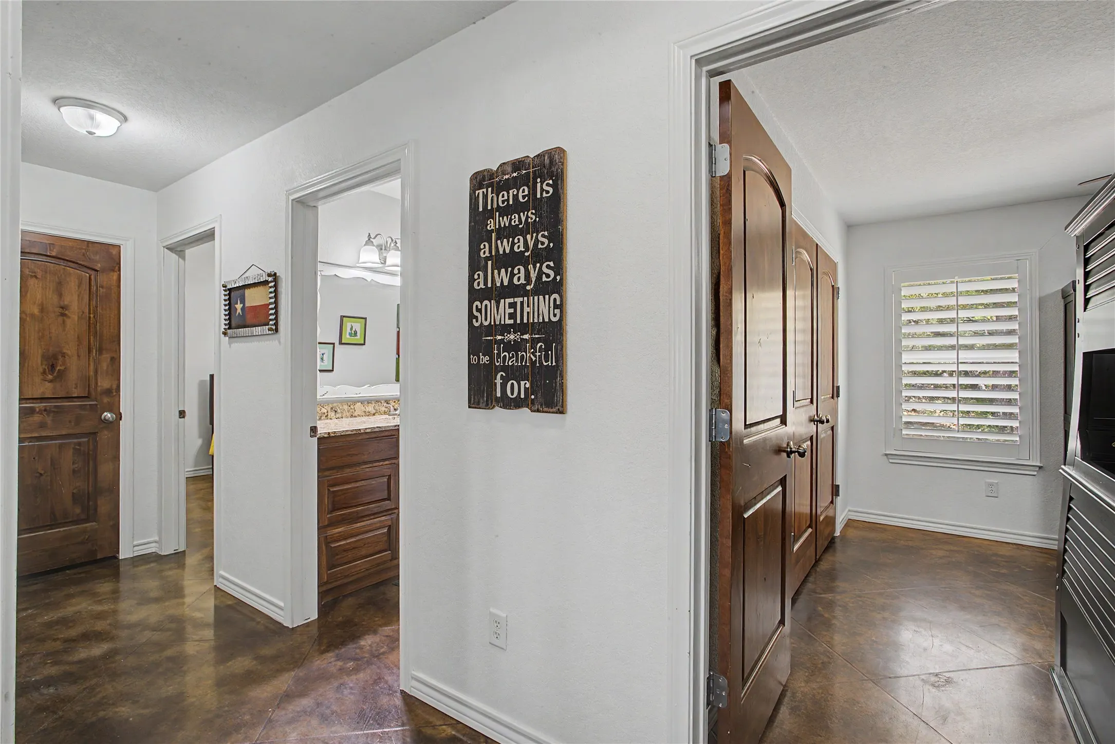 Hallway to split bedrooms
