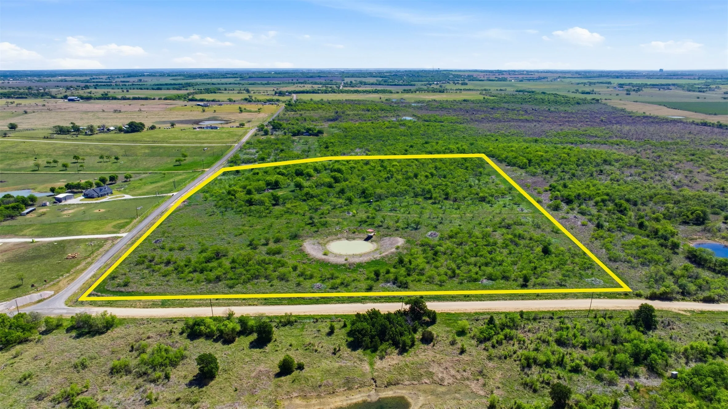 Expansive undeveloped land with natural vegetation