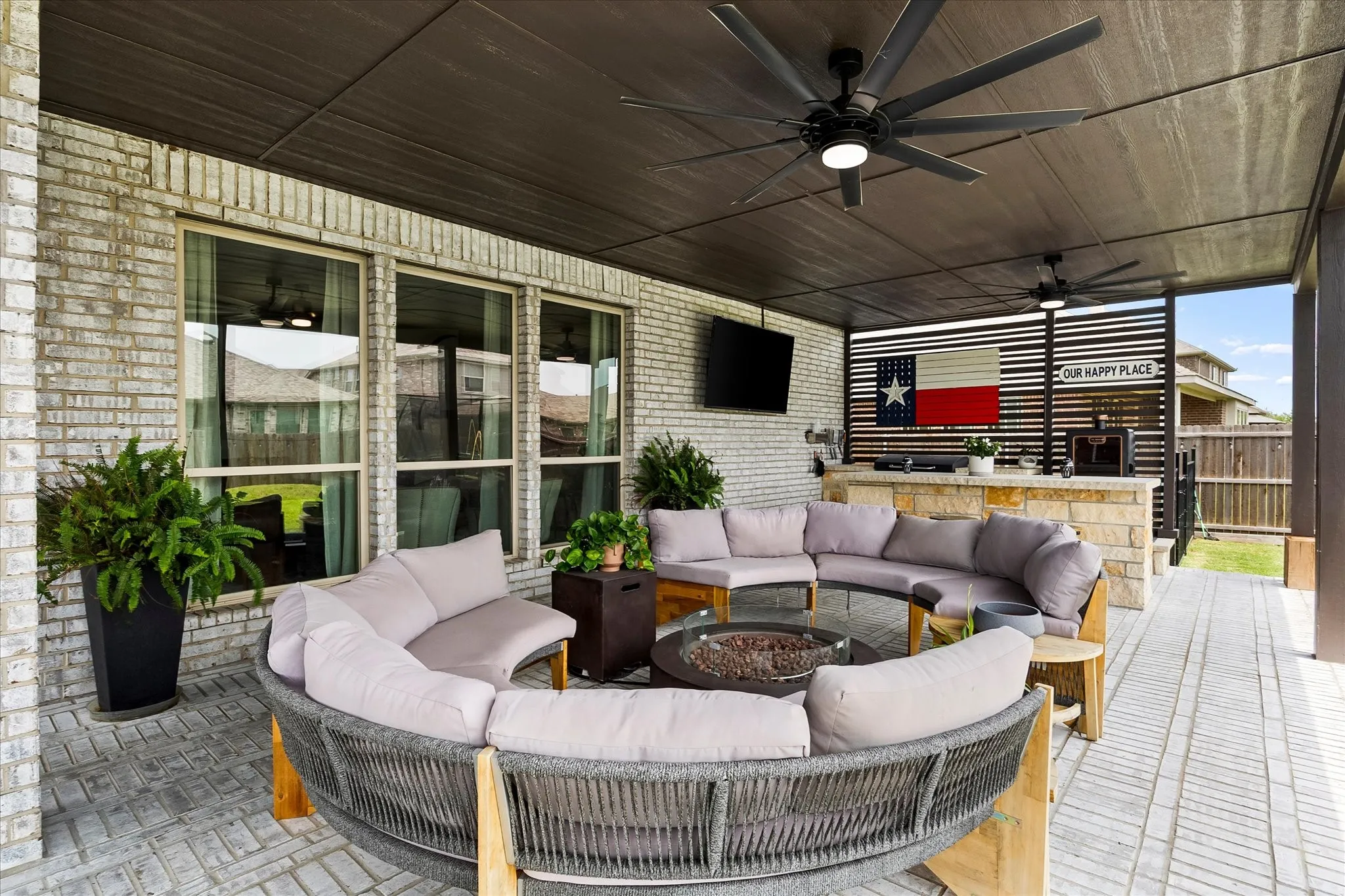 Covered patio featuring a paver stone surface