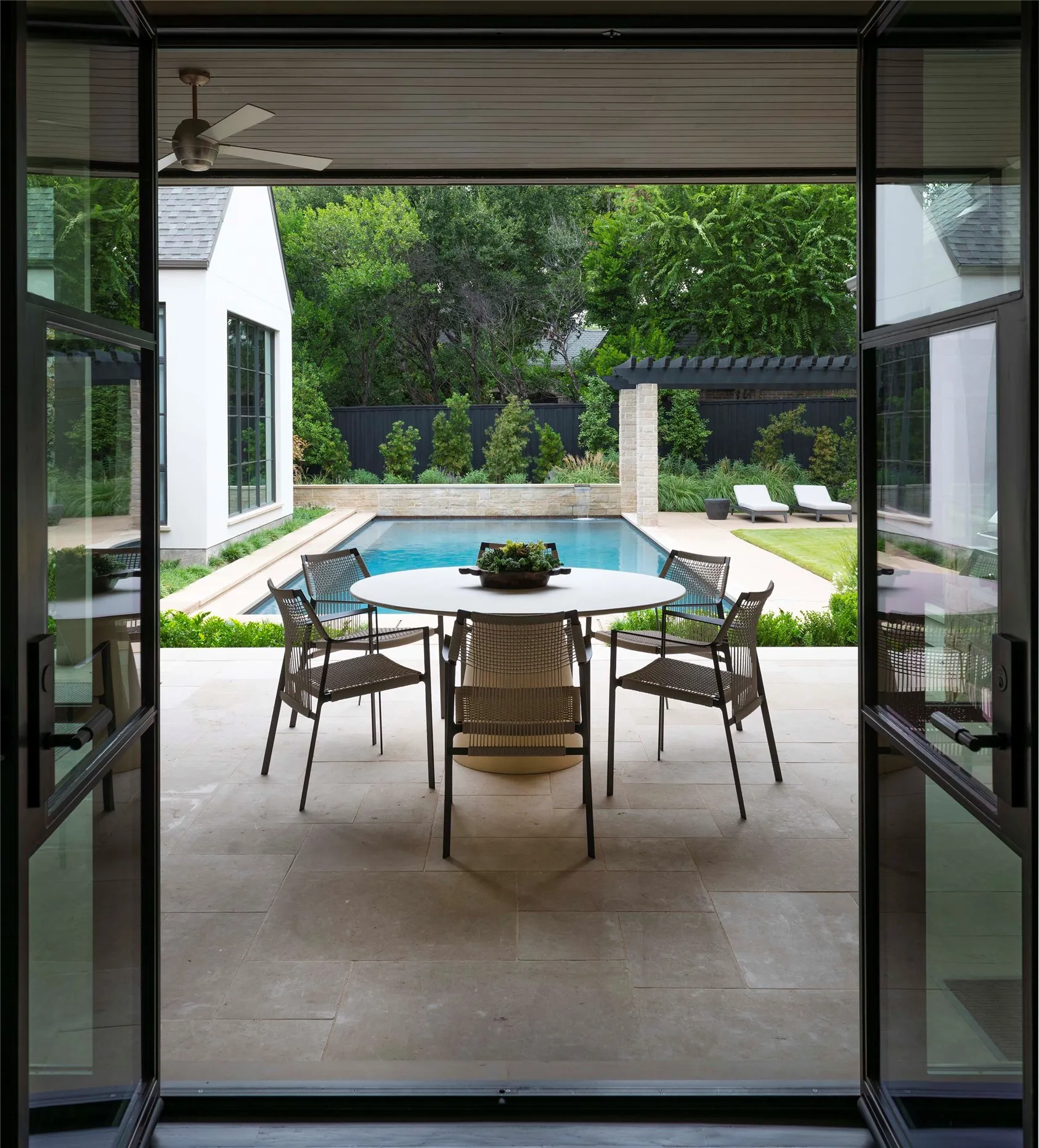Covered Loggia with sliding doors and remote screens
