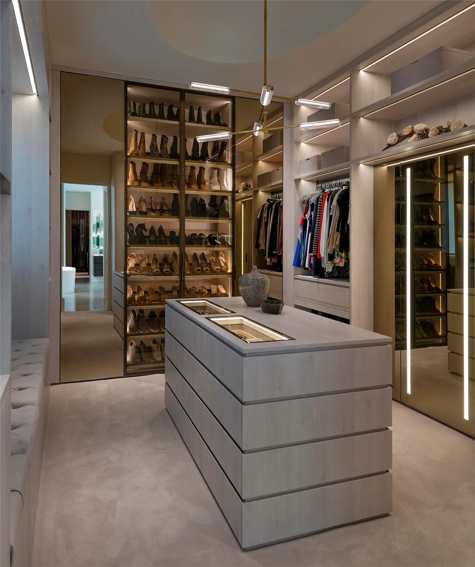 Eggersmann designed custom closet with sitting area
