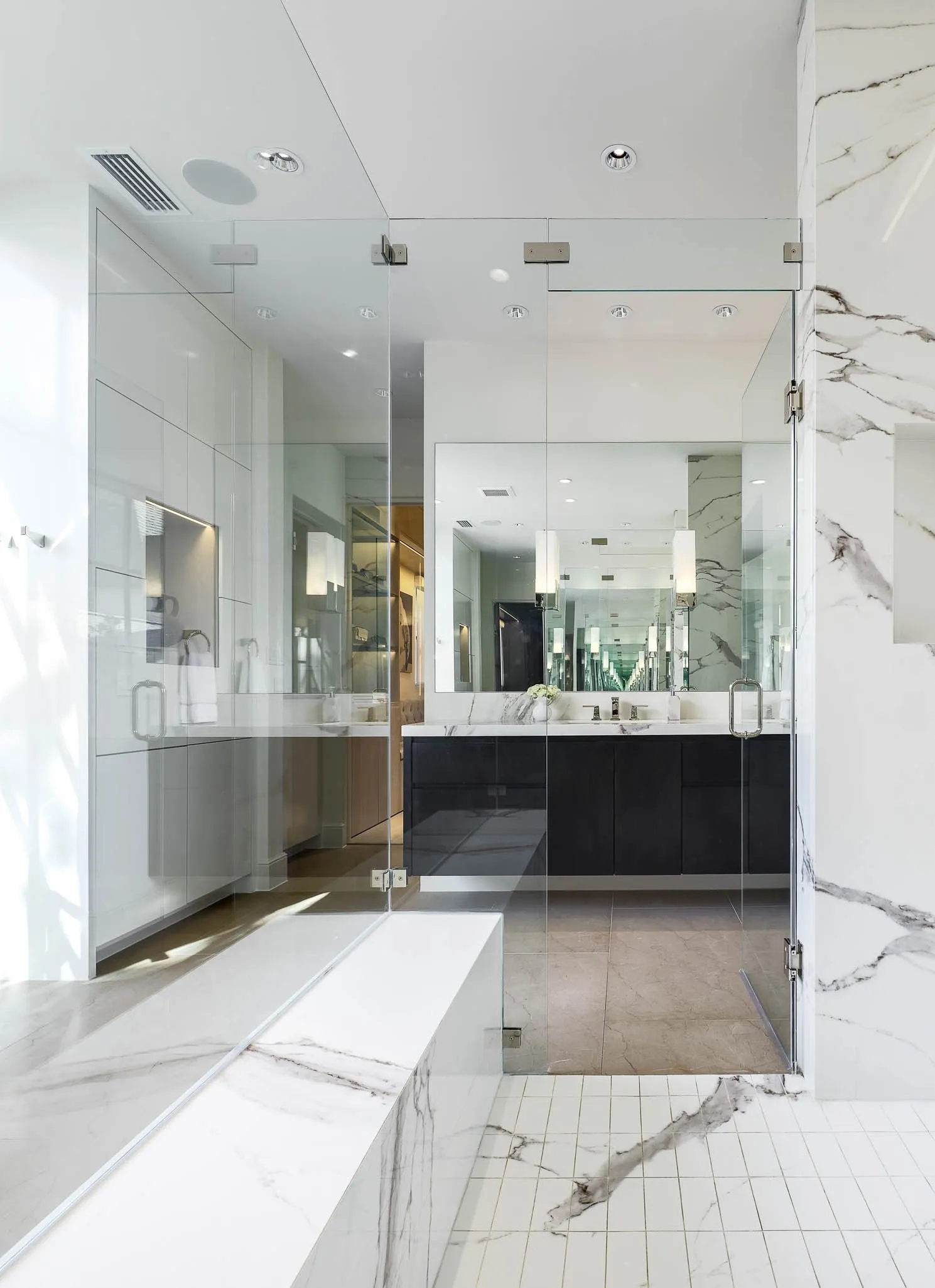 Primary bathroom with dual vanities