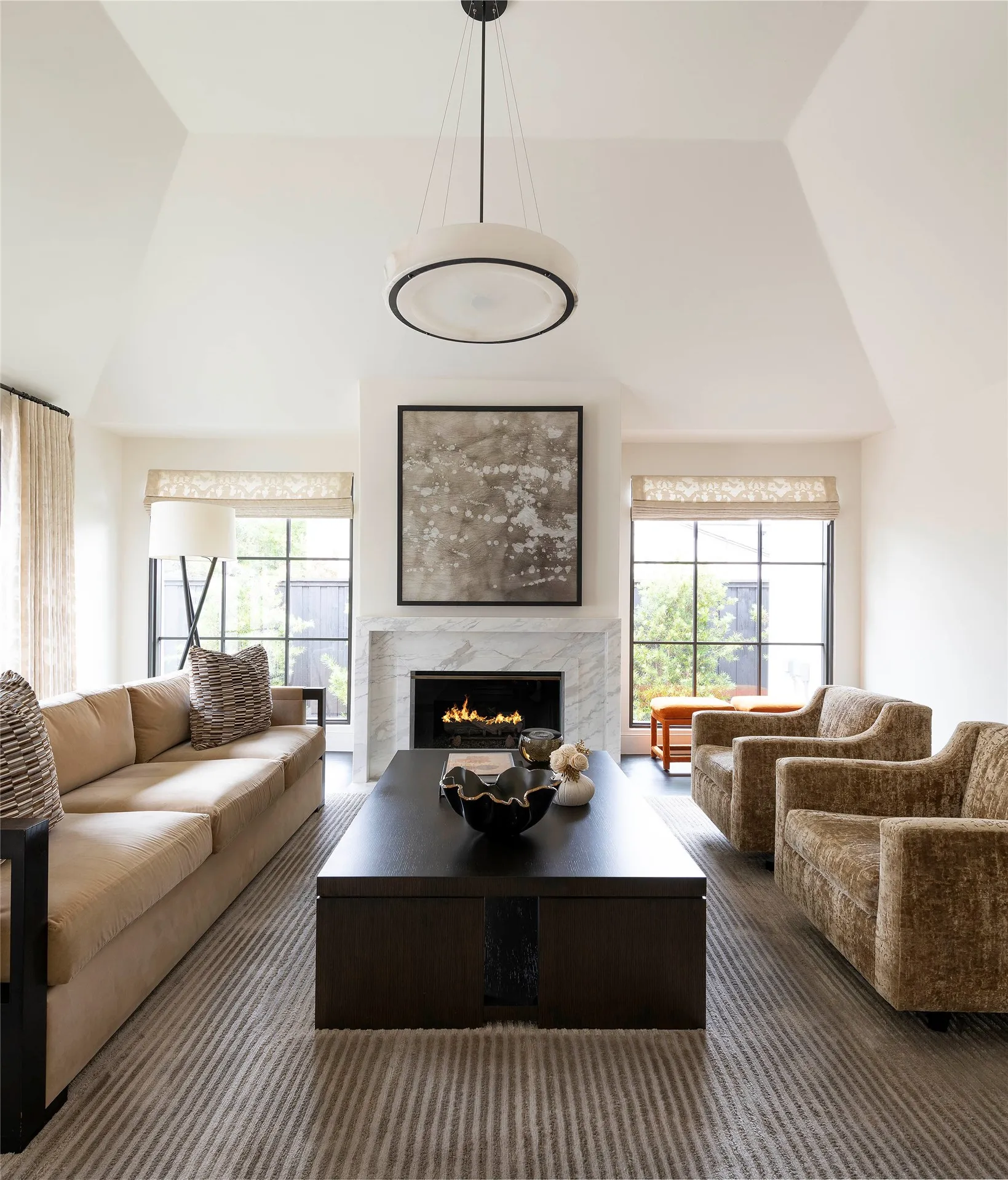 Den with gas fireplace and vaulted ceilings