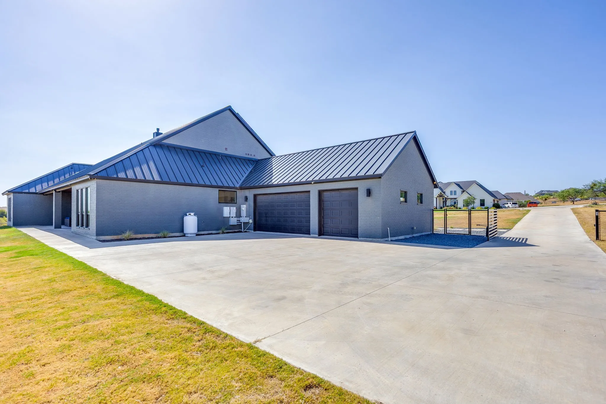 Oversized three car garage equipped with a 240V EV charging plug, two inverters and two back-up batteries for the solar panels.  Checkout the additional parking and widened, extended driveway