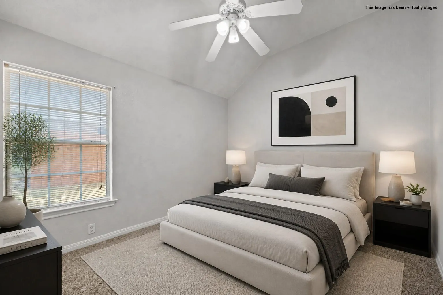 Vaulted ceiling with a ceiling fan, window with blinds, and carpeted flooring