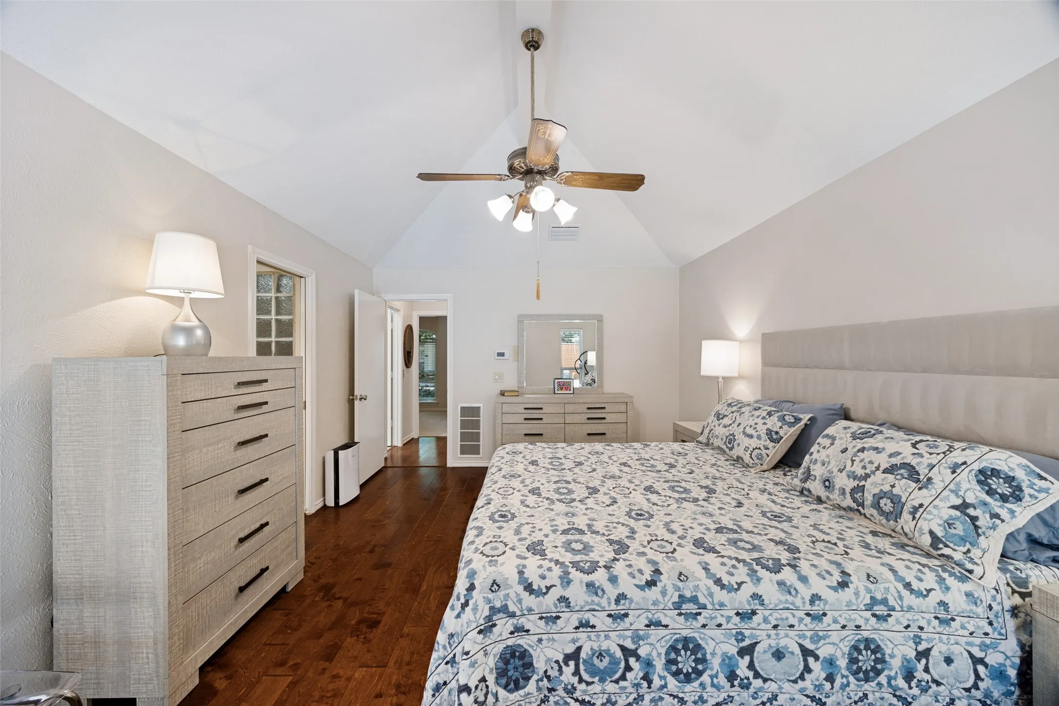 The tall vaulted ceiling makes this large bedroom feel even bigger!