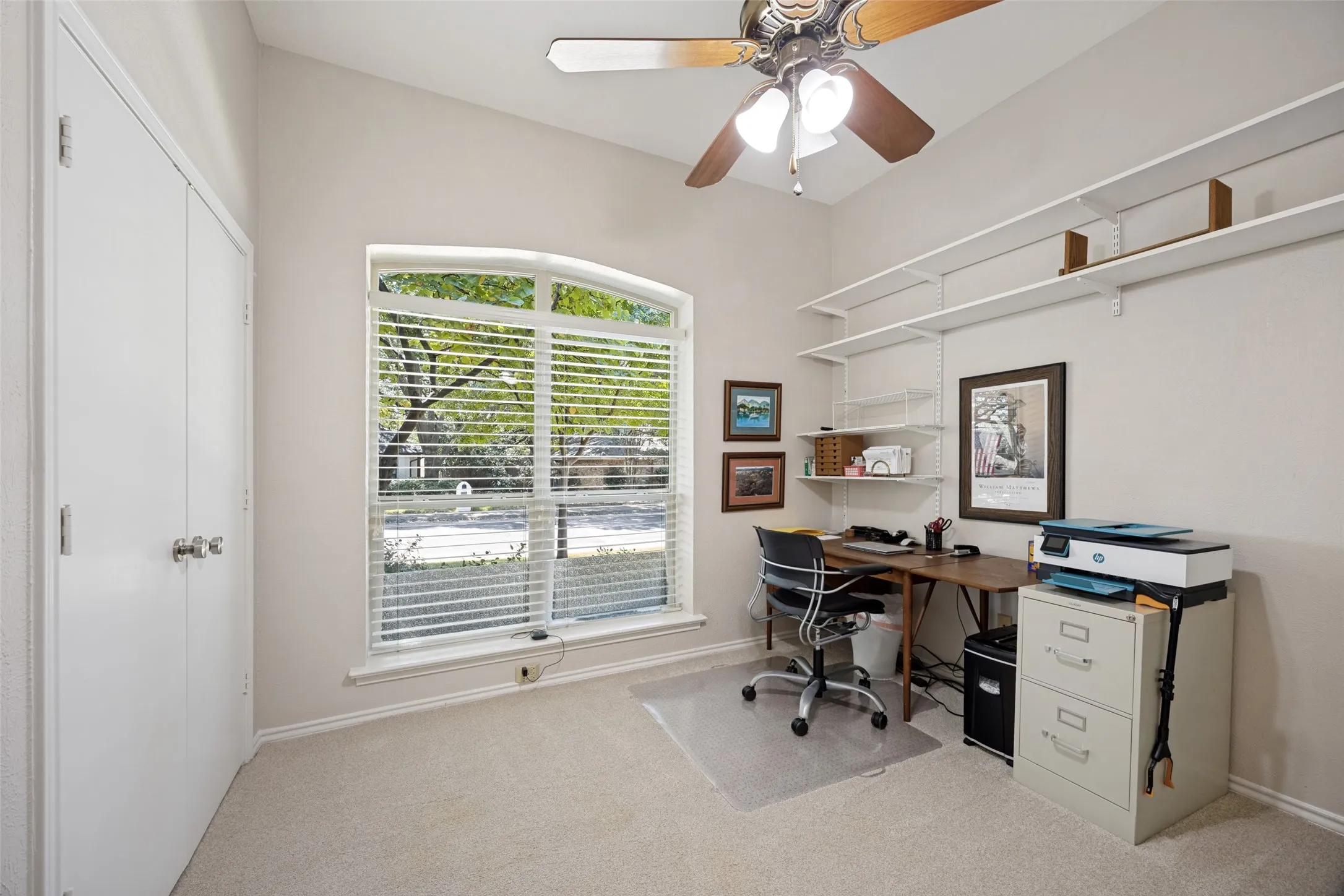 One of the secondary bedrooms currently used as a study.