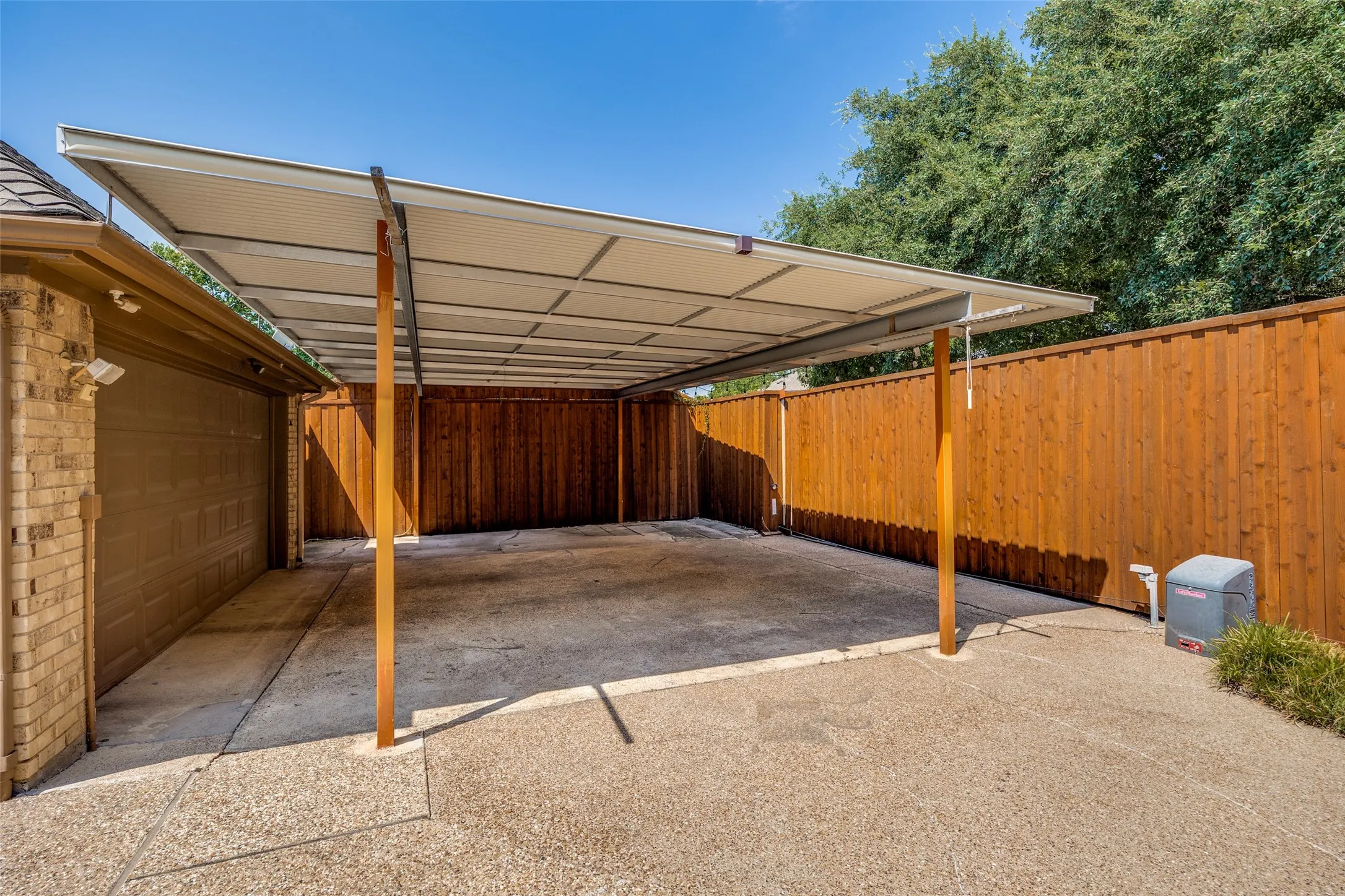 Additional covered parking under the carport.