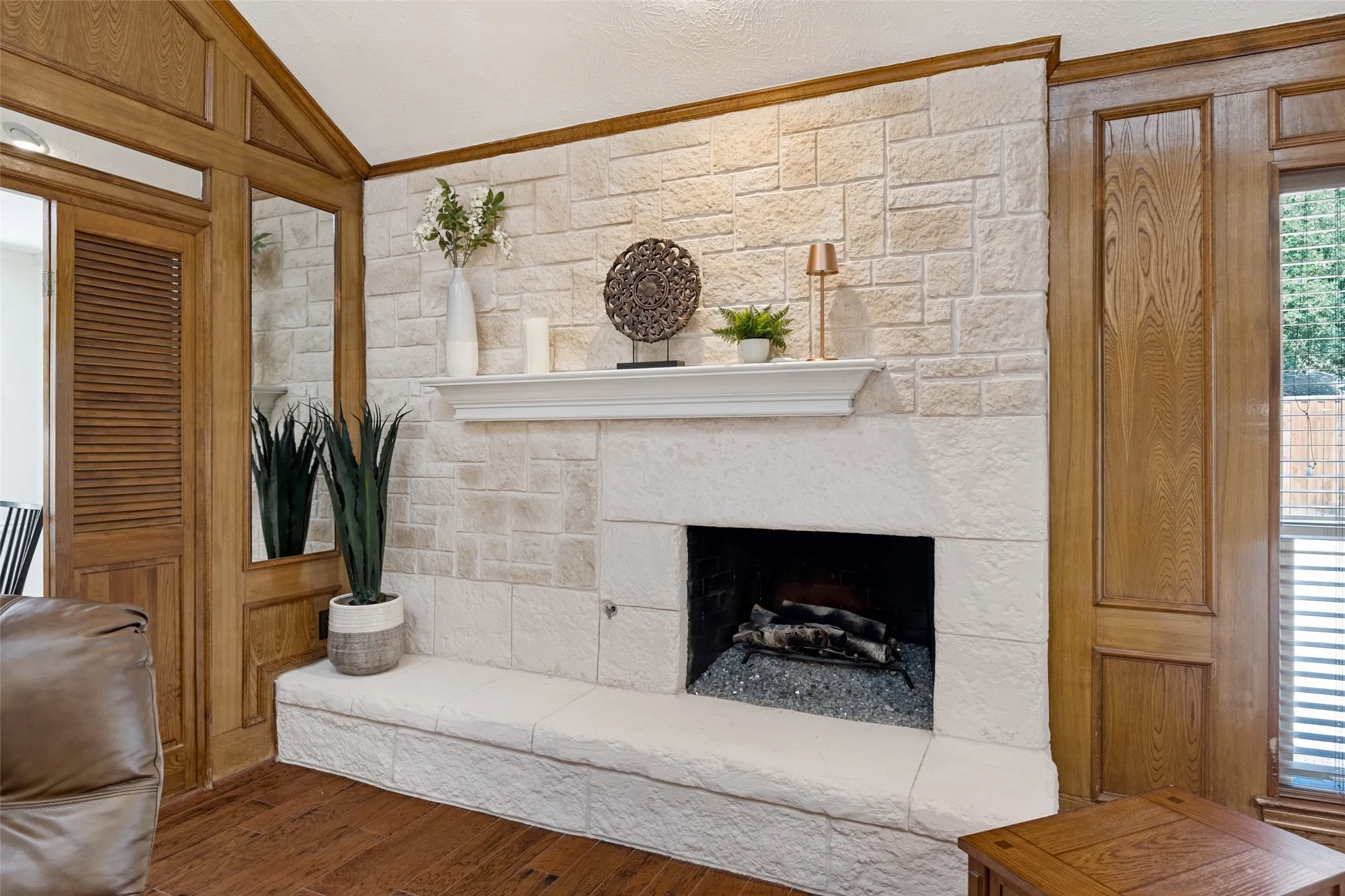 The fireplace was resurfaced and updated in 2019.