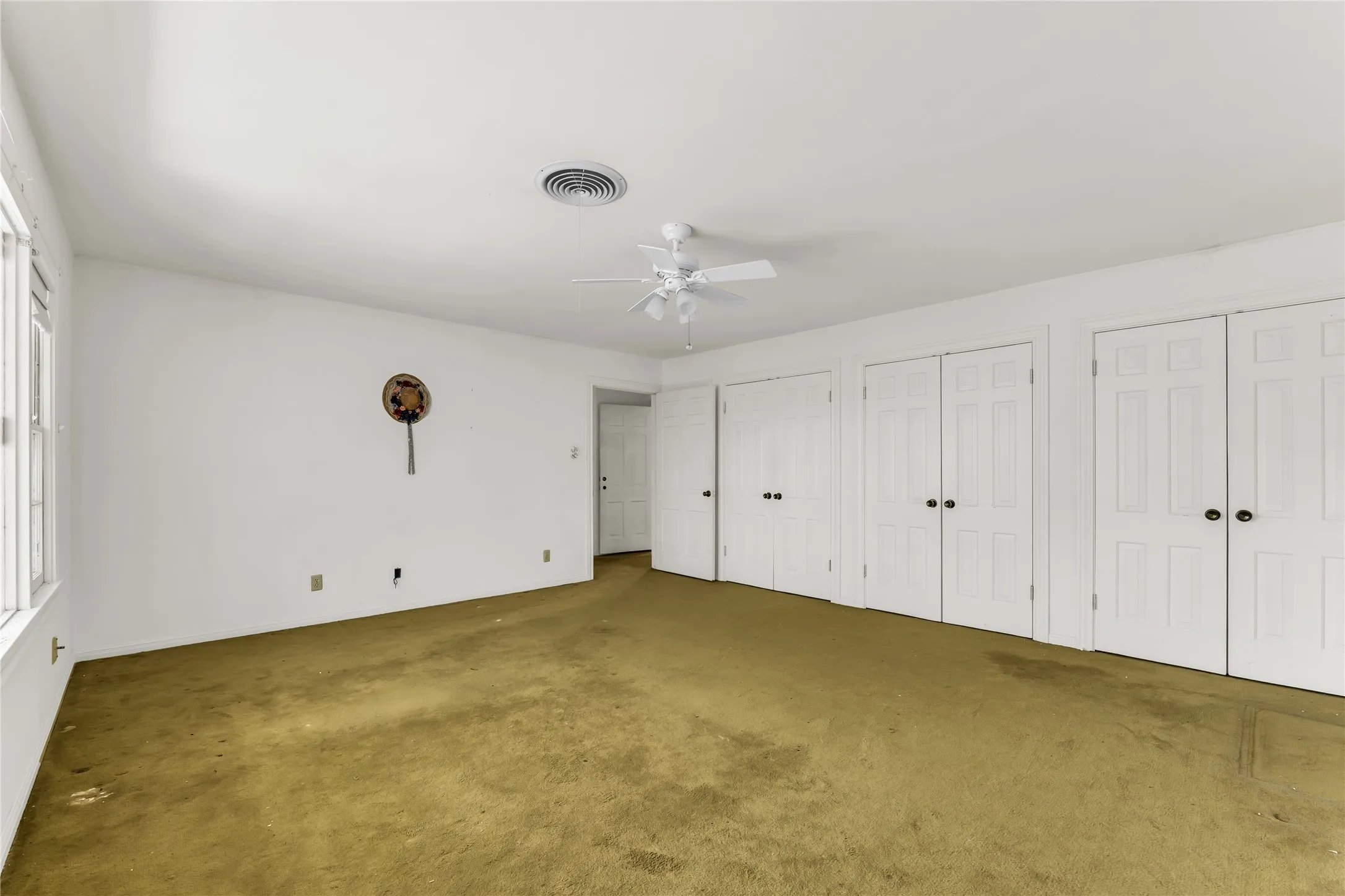 Upstairs, her primary bedroom with closets