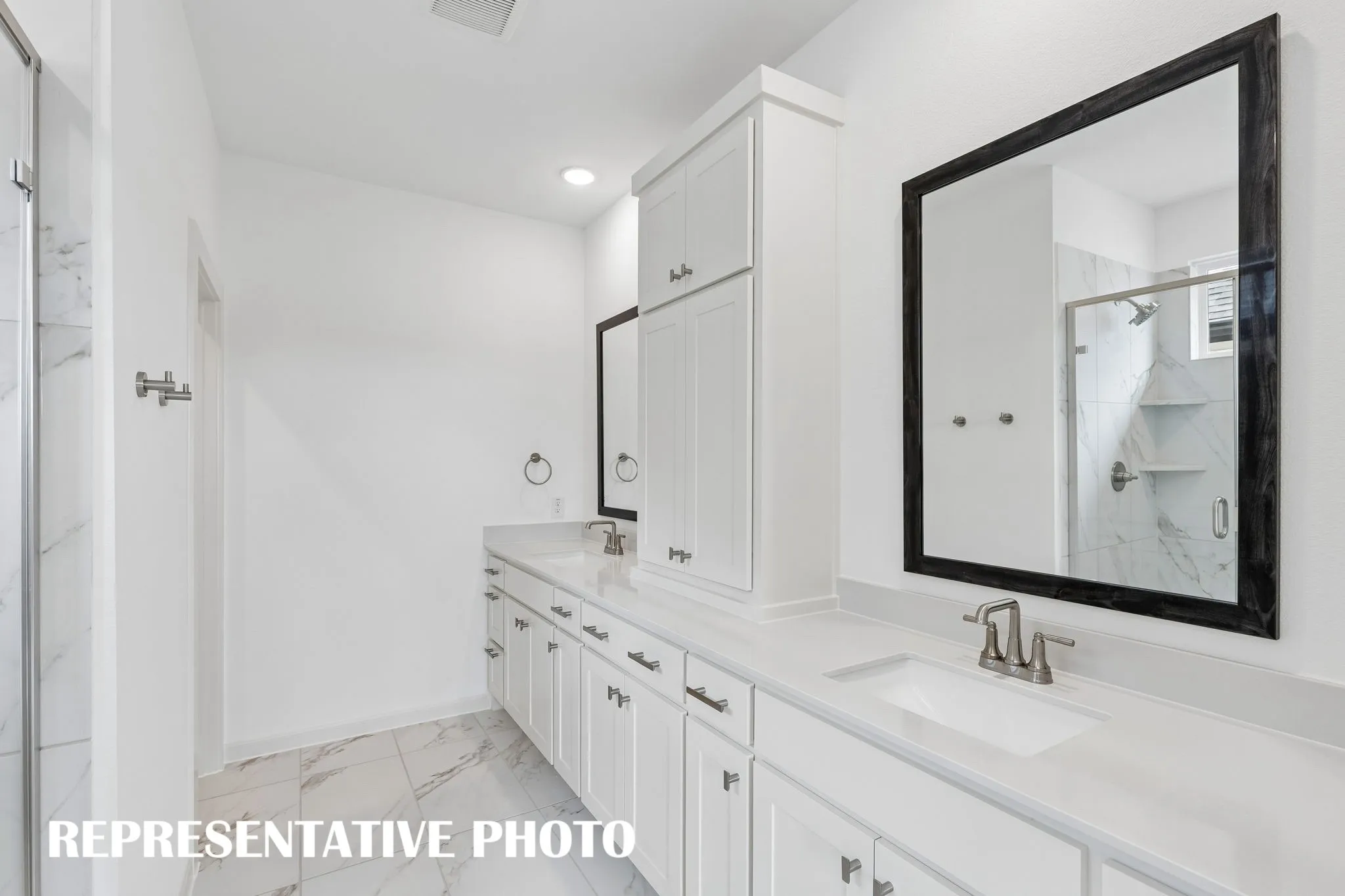 This luxurious owner's bath was designed for two!  REPRESENTATIVE PHOTO