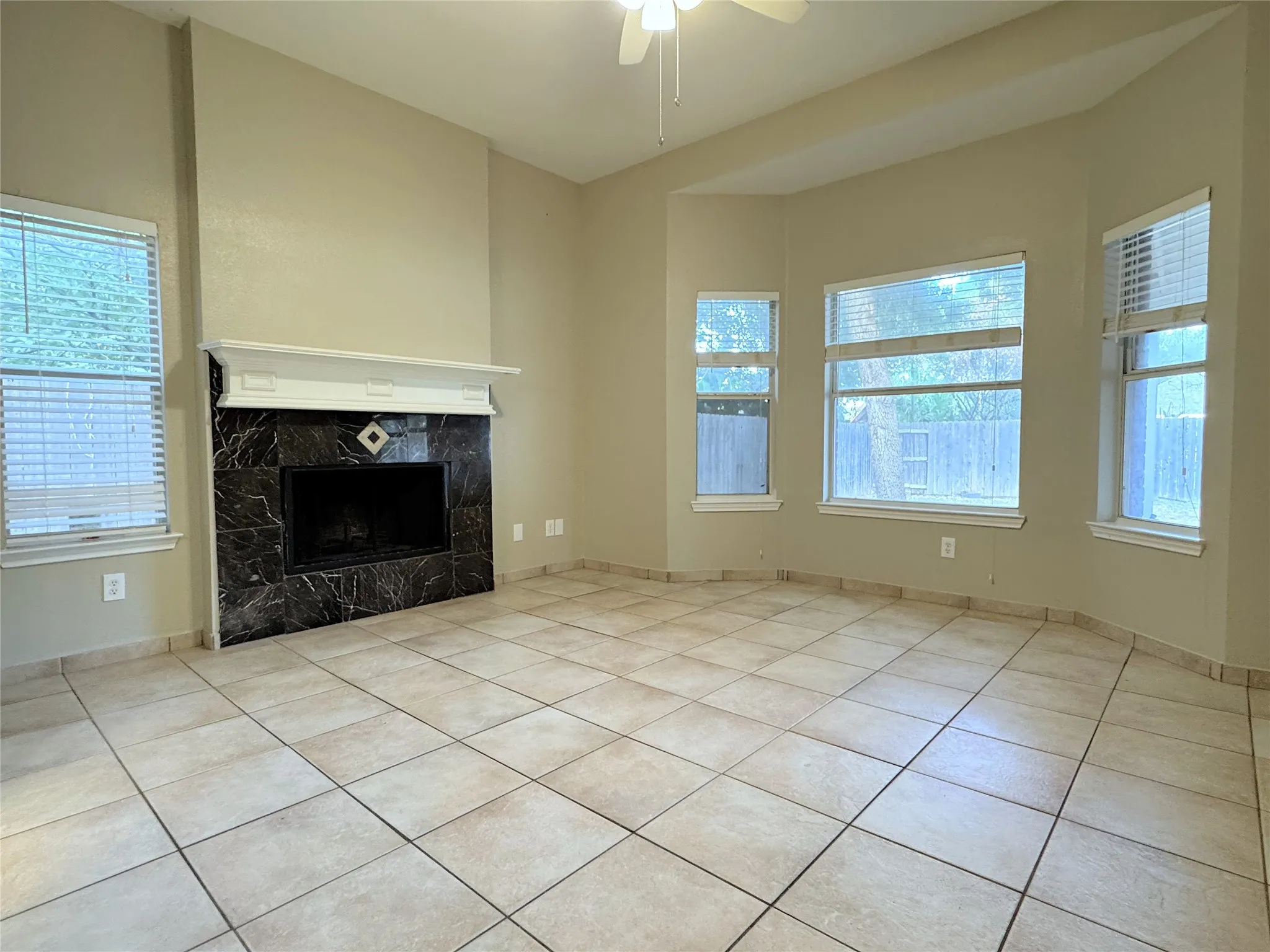 Primary bedroom also has a wood-burning fireplace