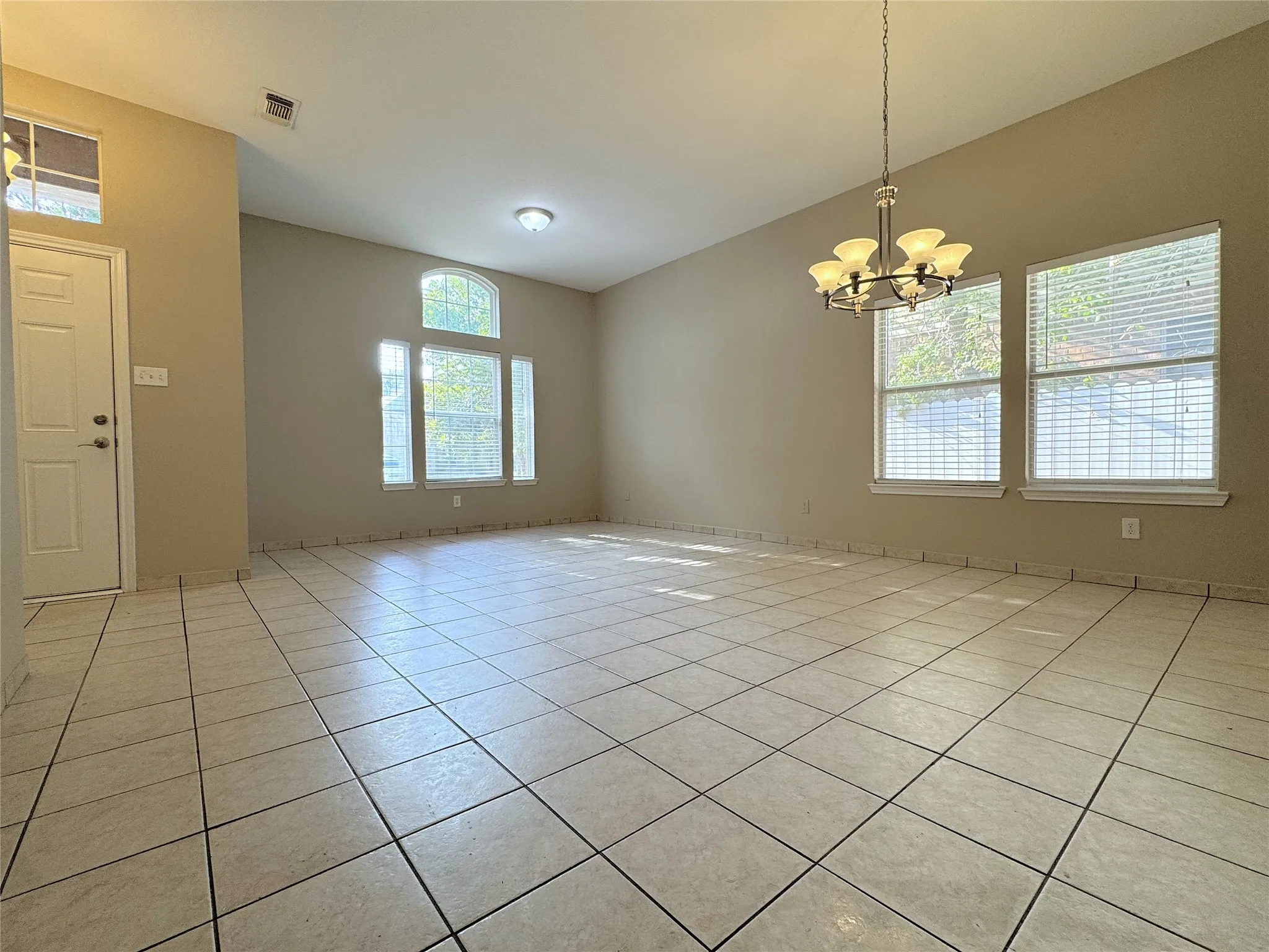 Entry with living room and formal dining
