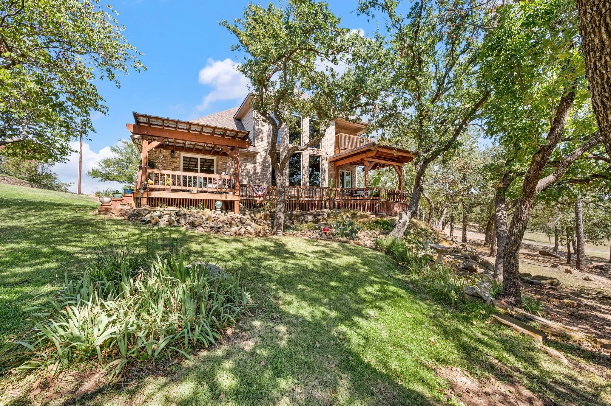 The decks span the entire length of the back side of the home!