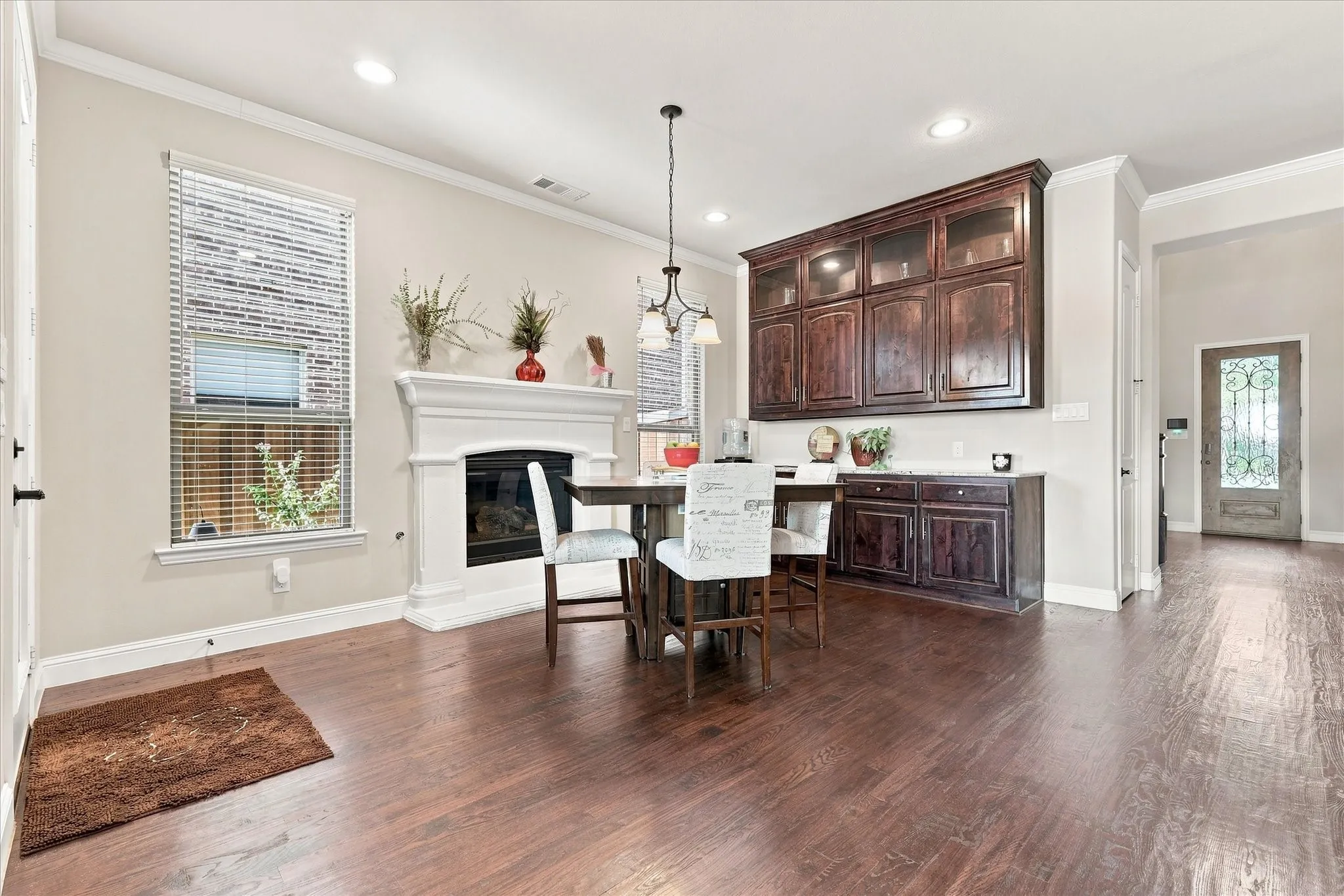 Charming dining room with built-in buffet & fireplace