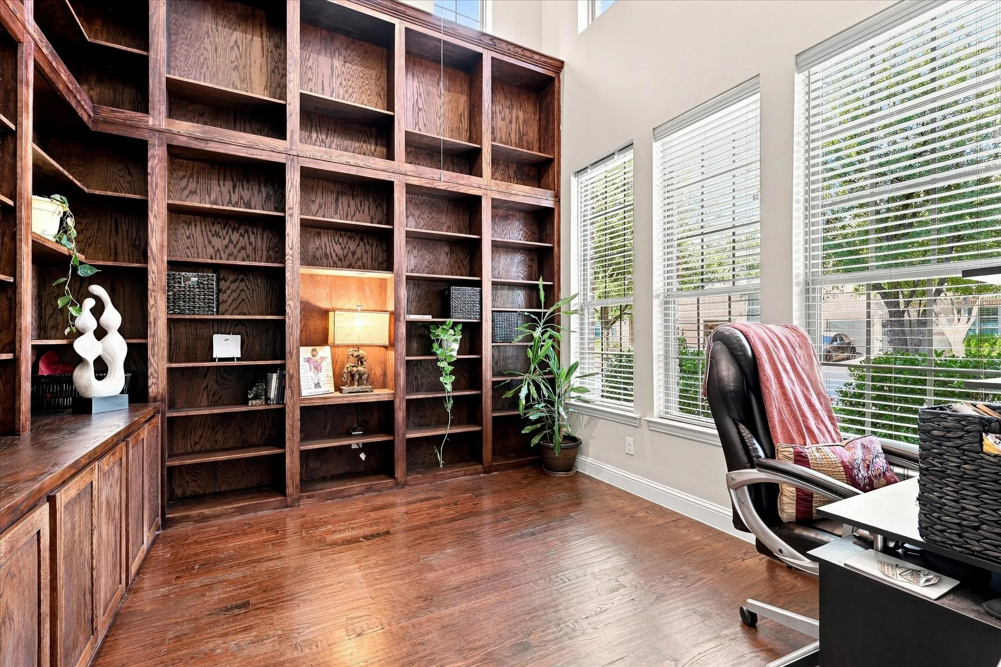 Private dedicated office, complete with custom floor-to-ceiling built-ins