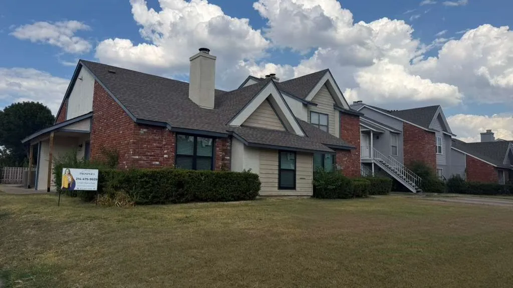 Brick and siding exterior with gabled roof lines