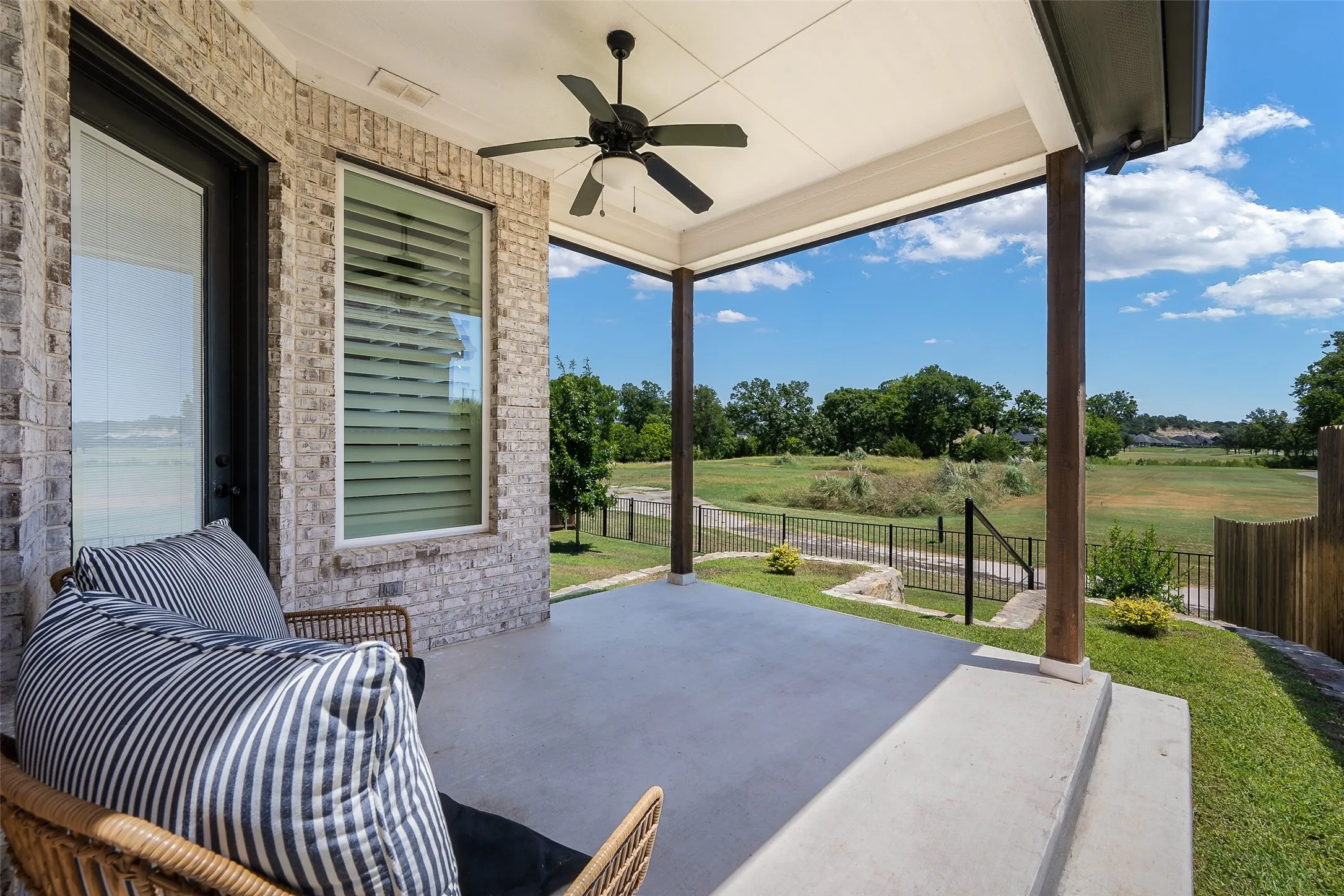 Covered back patio, view of the 5th hole