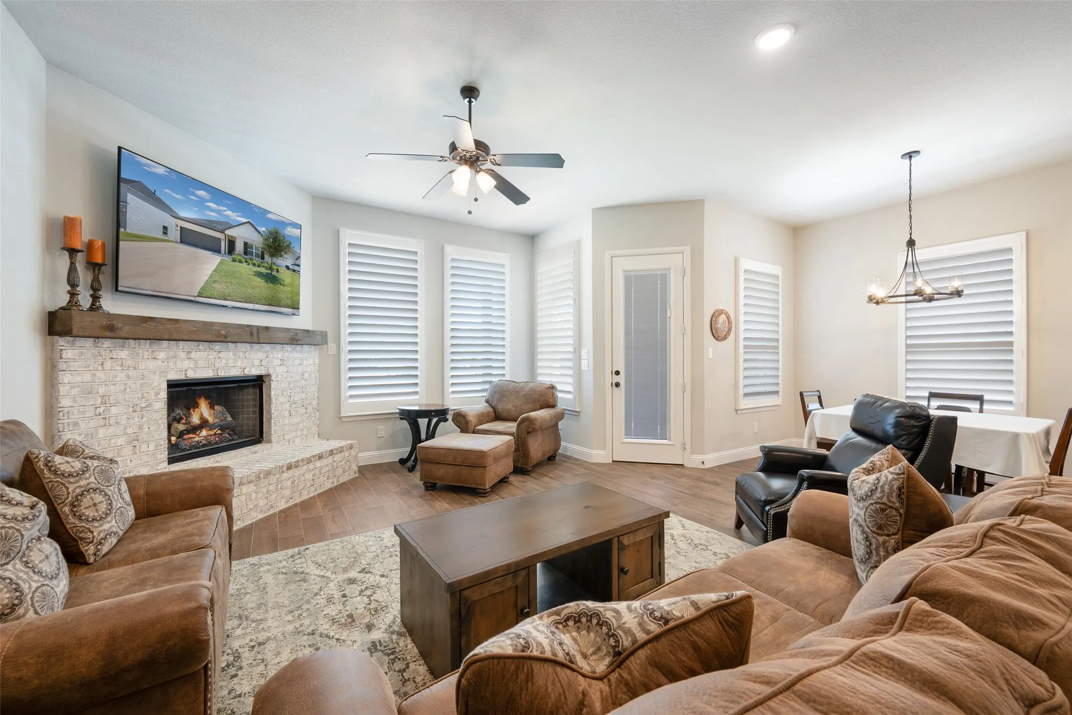 Spacious living room with wood burning fireplace