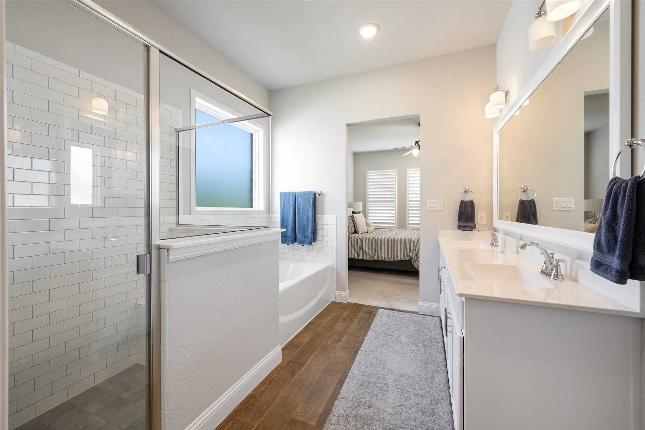 Master bathroom with separate shower and garden tub