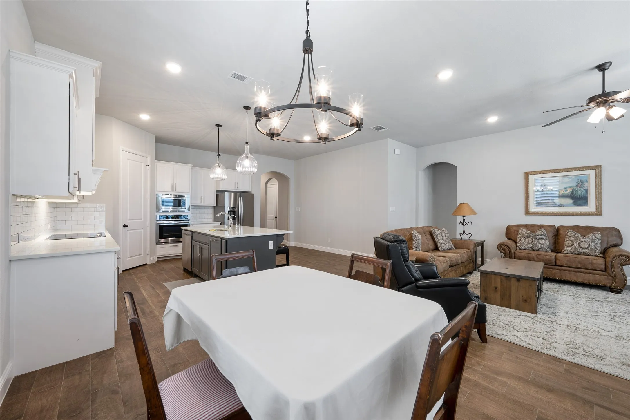 Open concept dining, kitchen and living room