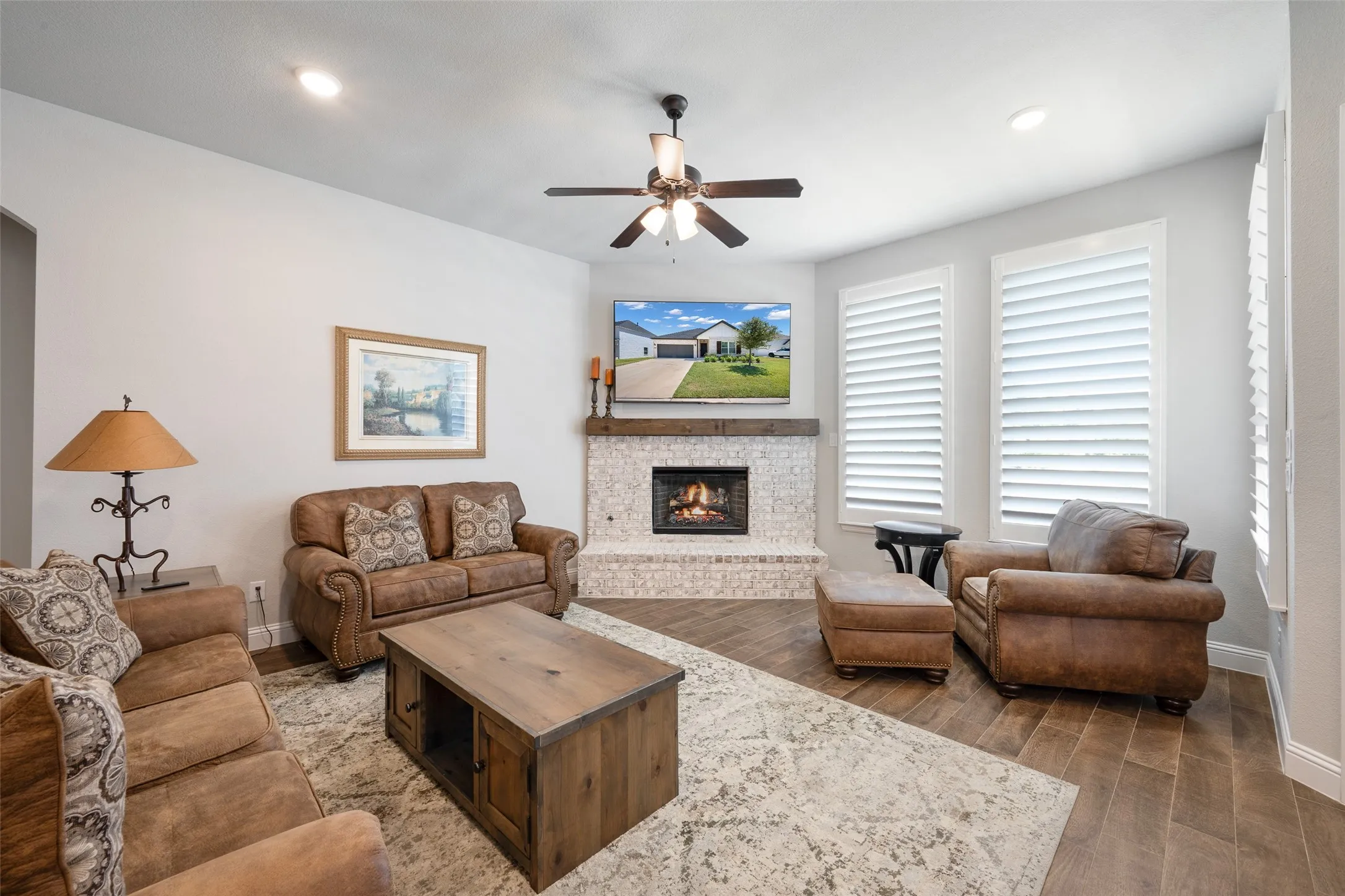 Spacious living room with wood burning fireplace