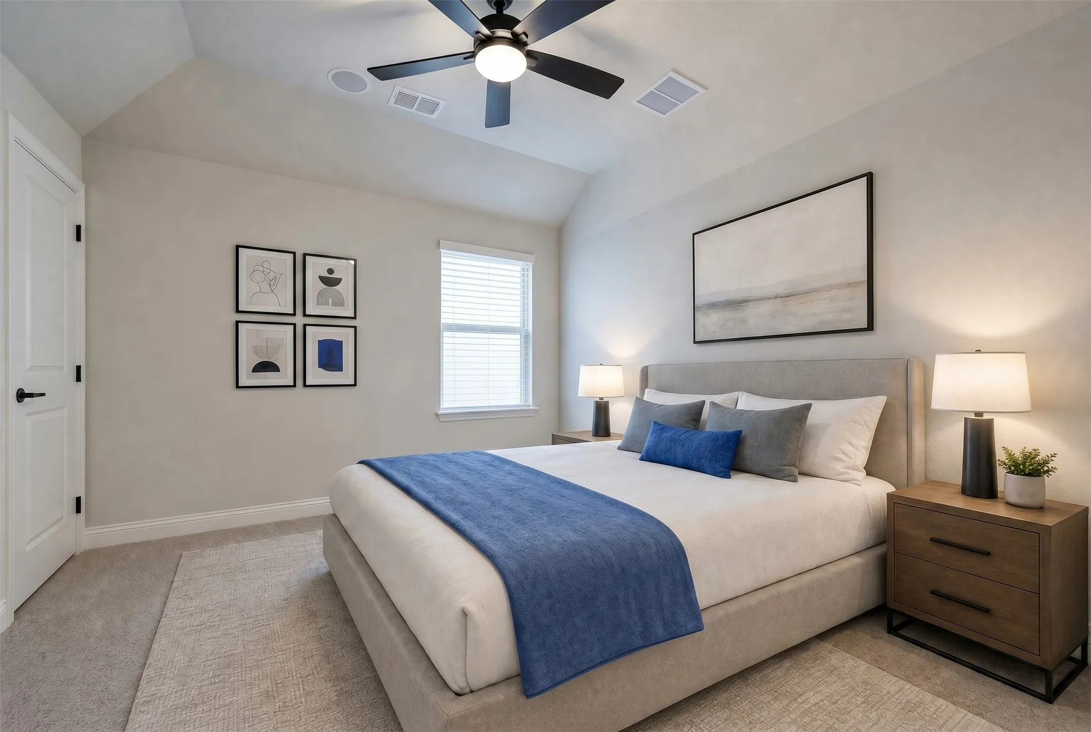 Vaulted ceiling with a ceiling fan, window with blinds, paneled door with dark hardware, and carpeted flooring