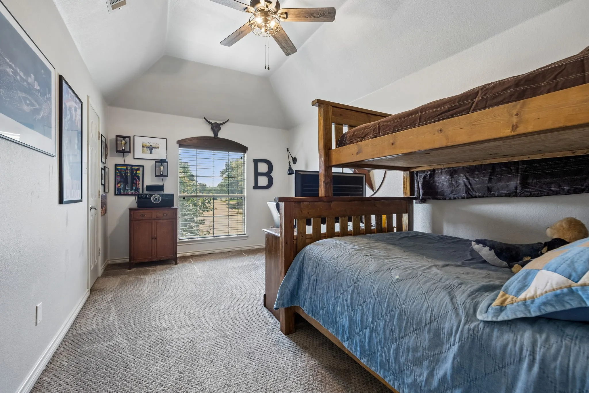 A Spacious Secondary Bedroom - Vaulted ceilings add volume to this generously sized upstairs bedroom, while a large window brings in natural light and provides plenty of flexibility for sleeping, studying or relaxing. All bedrooms have large walk-in closets.