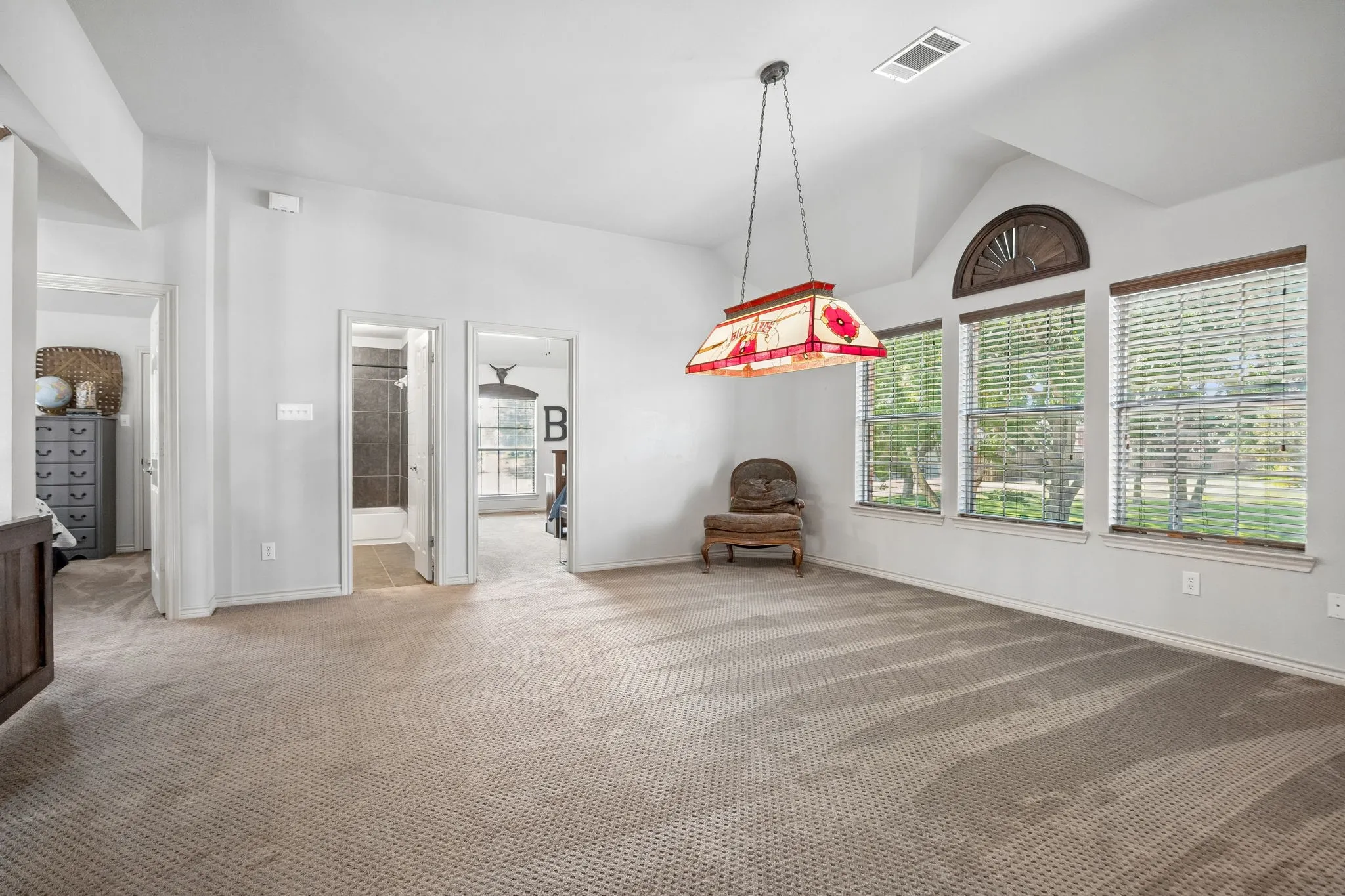 Room to Play, Work or Gather - This expansive upstairs bonus space offers flexibility for game tables, homework stations, exercise equipment or casual seating while keeping activity separate from the main living areas downstairs.