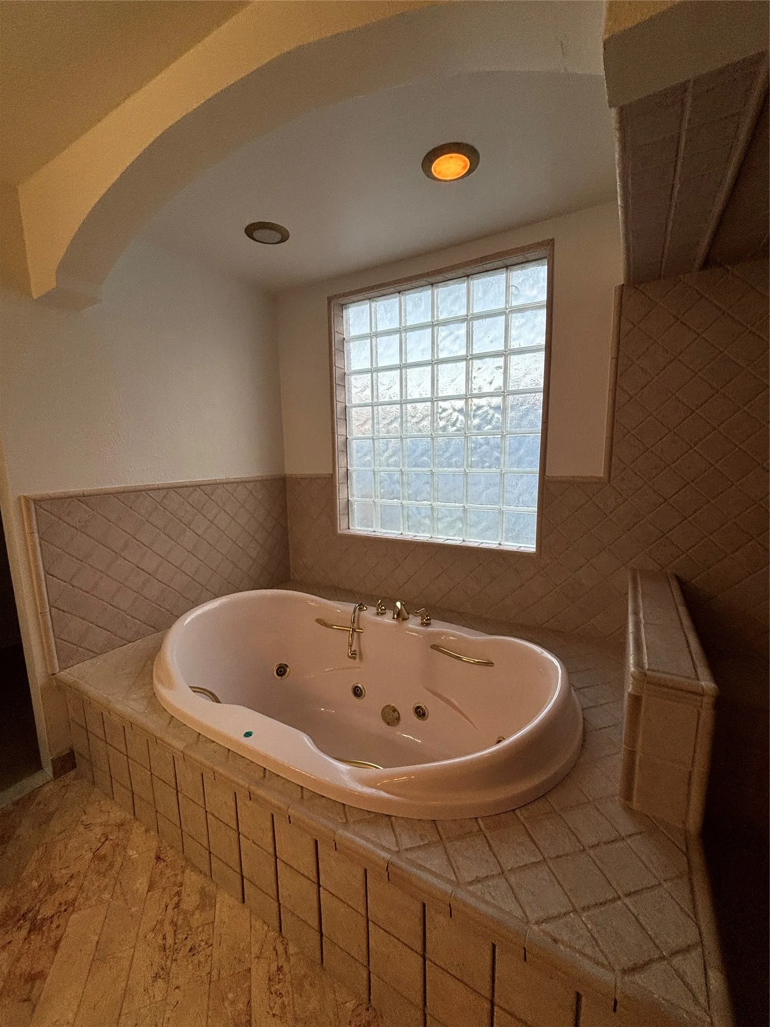 Bathroom with a whirlpool tub