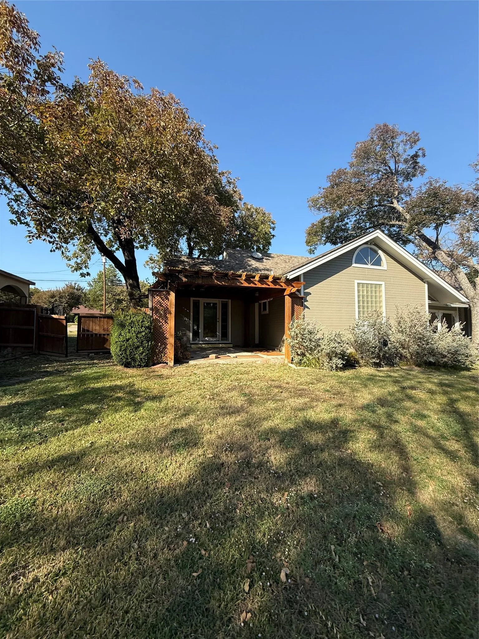 Rear view of house featuring a patio