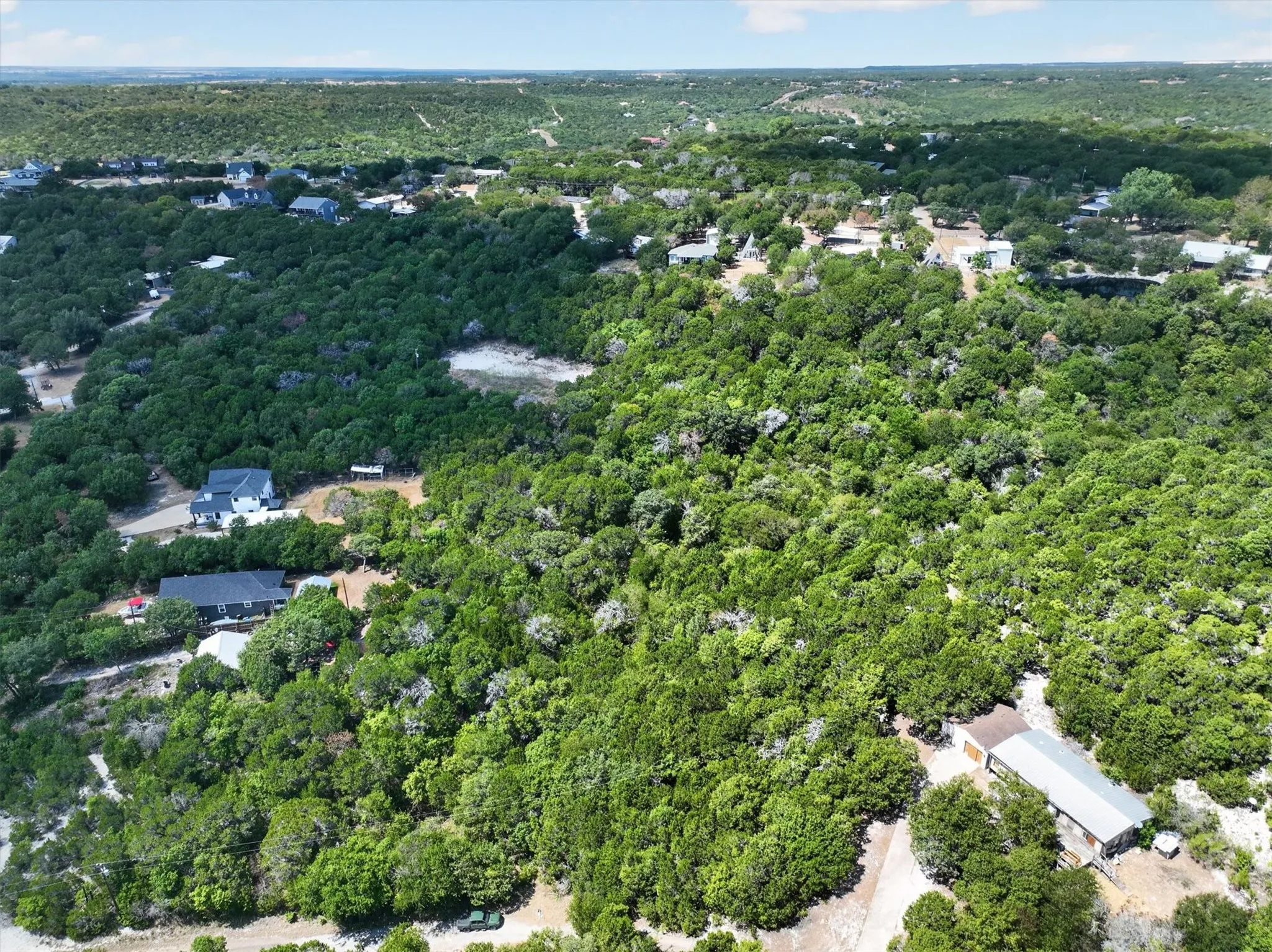 Expansive treed landscape with multiple building sites