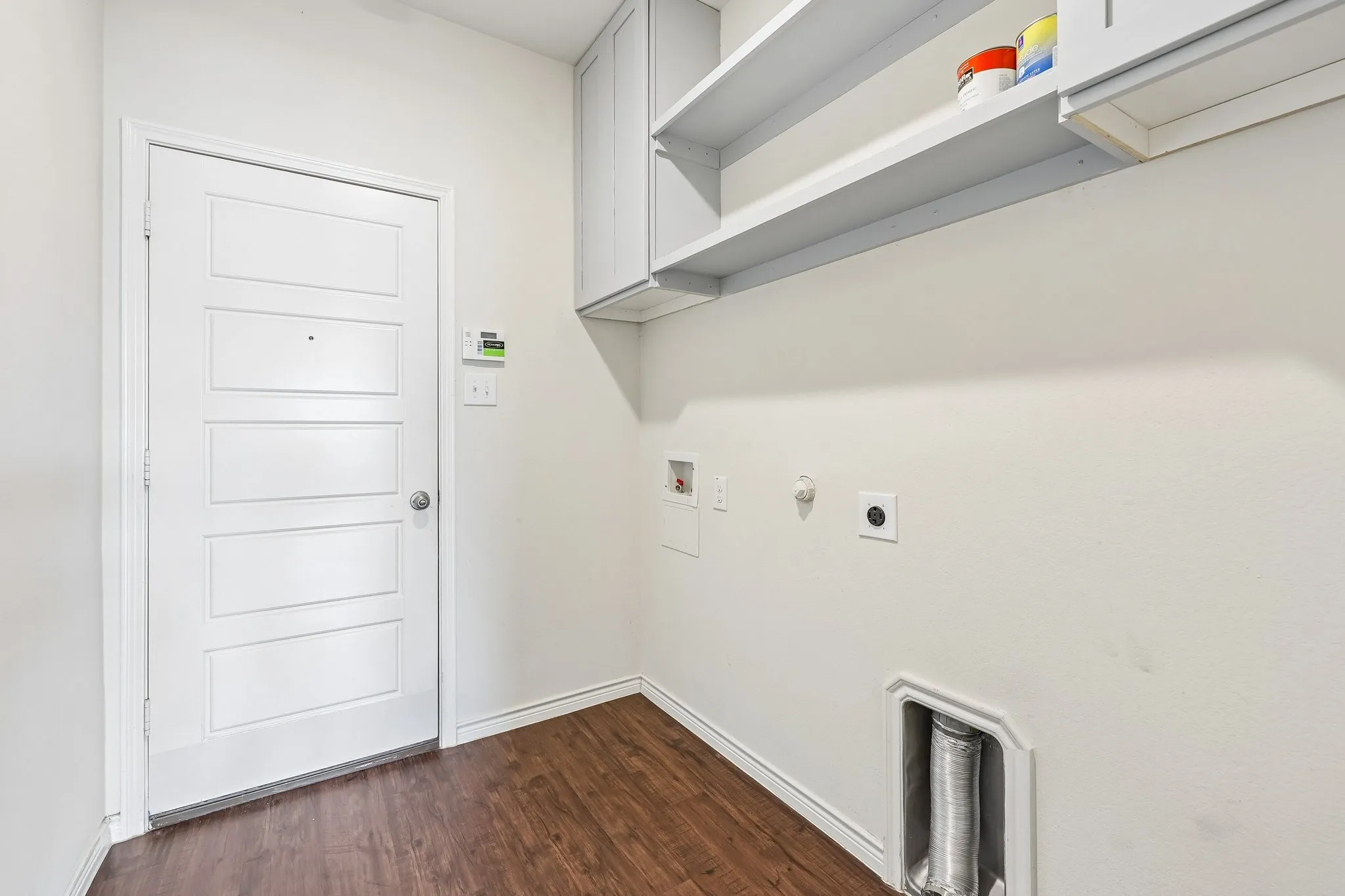 Wood-finish flooring with white walls