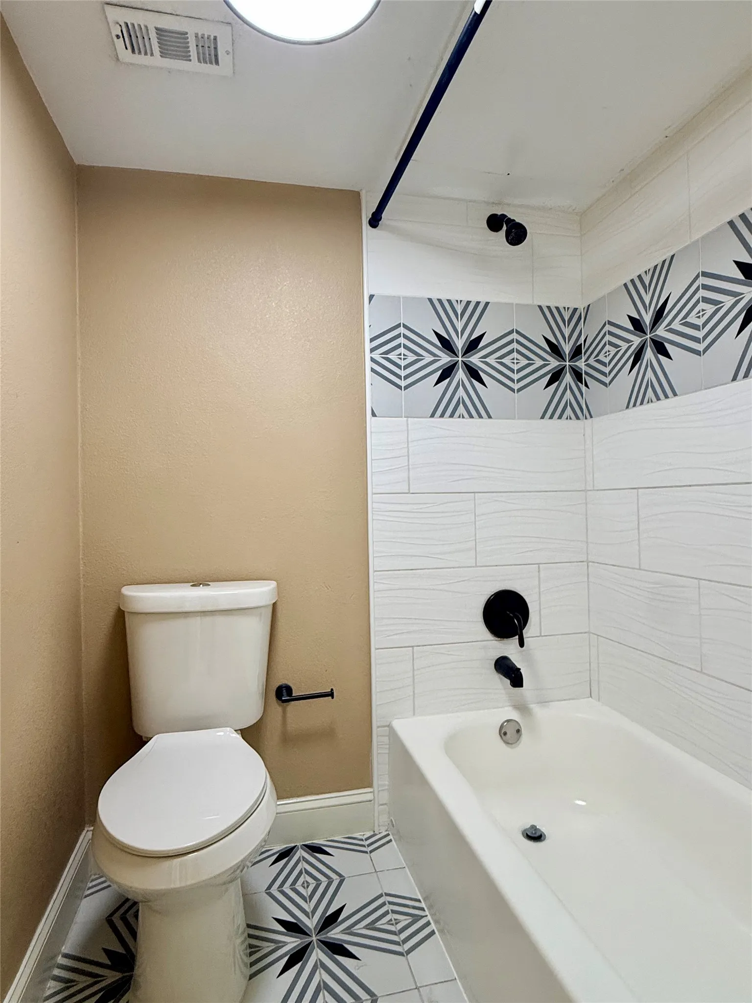 White subway-style tile with an accent band