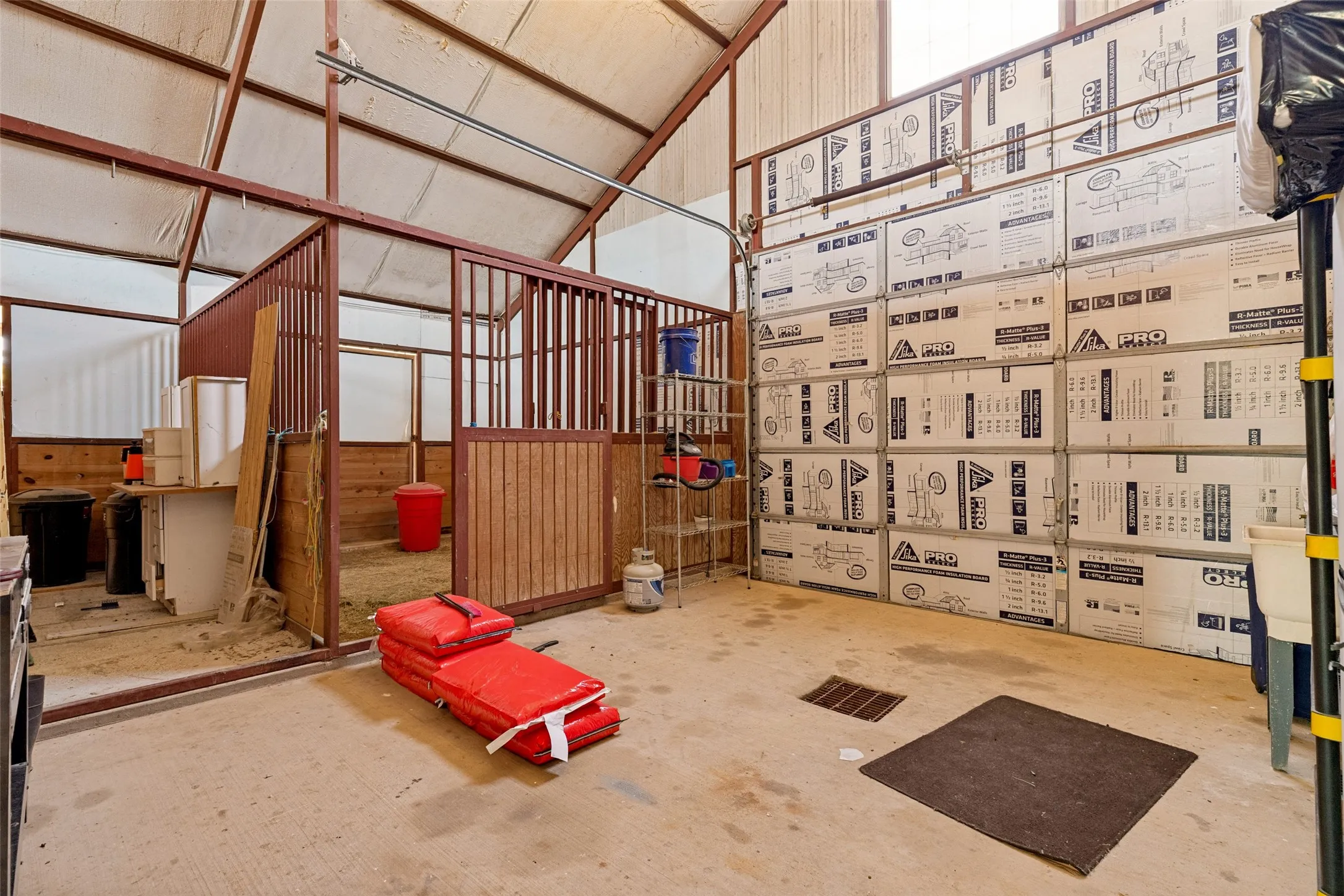 Tack room with 1/2 a stall for feed