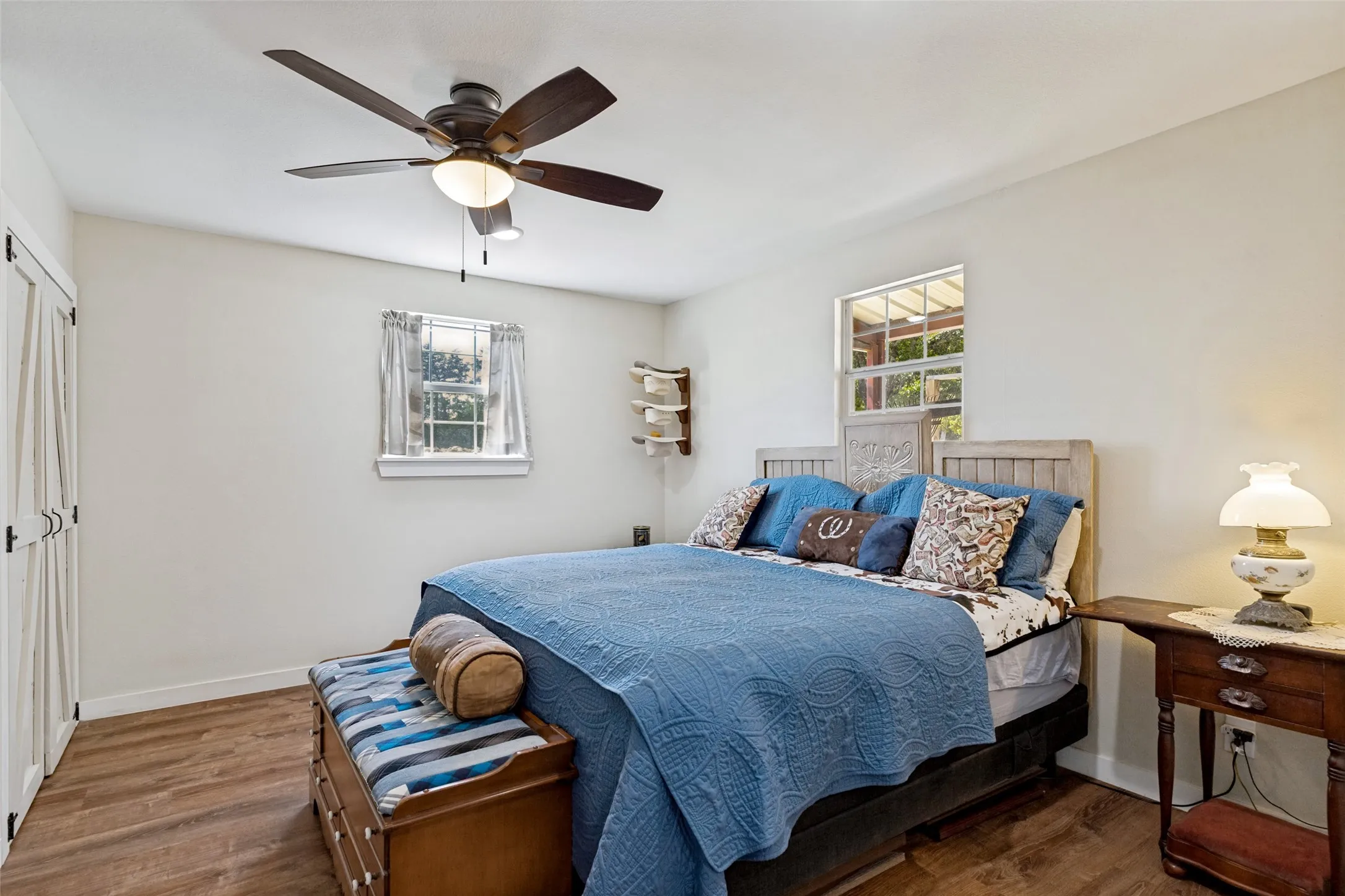 Primary bedroom has his and her closet areas!