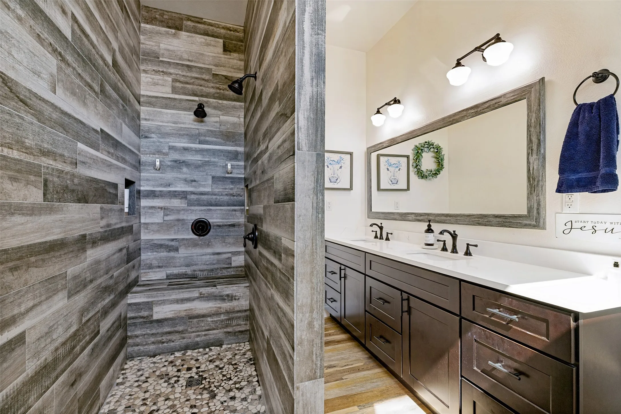 Primay bathroom. Dual sink, large walk in shower