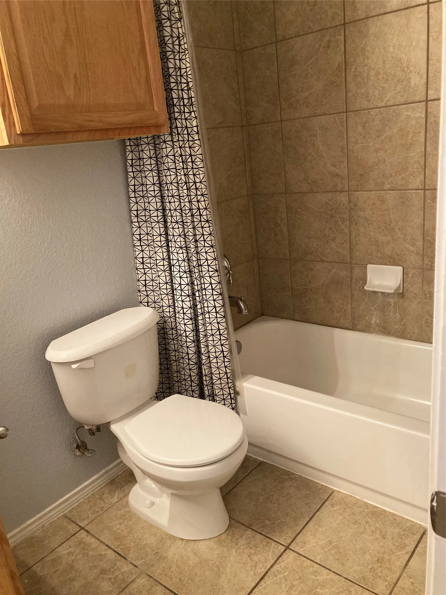 Hall bath that serves the secondary bedrooms.
