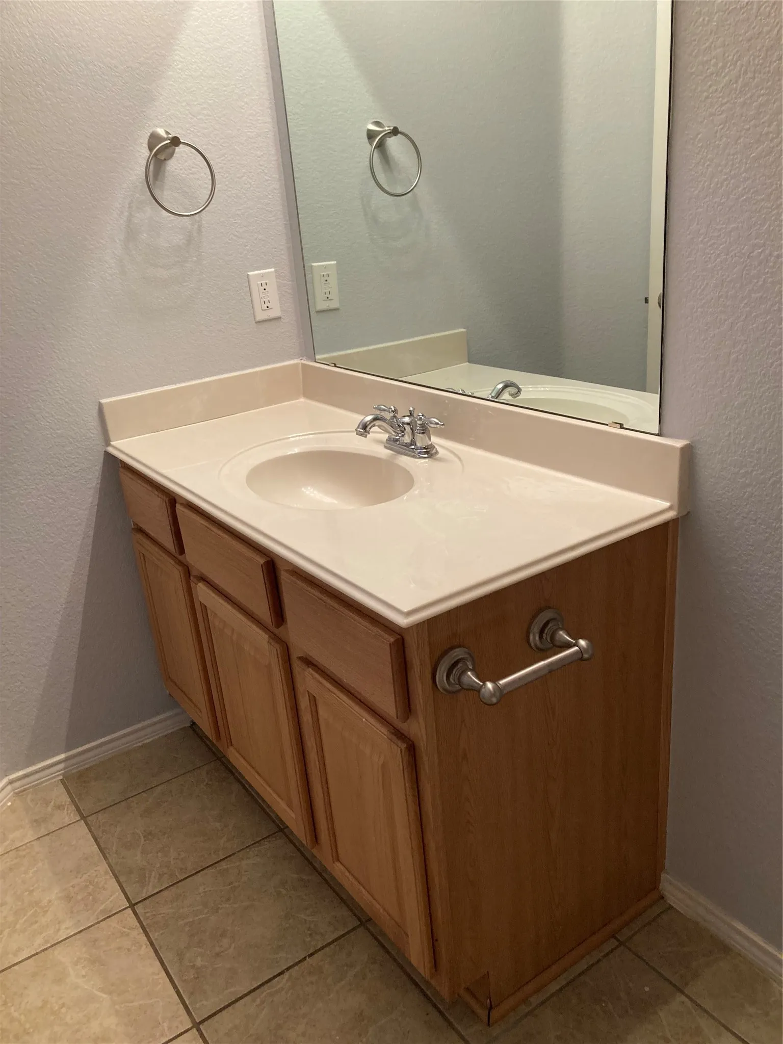 Sink in the hall bath serving the secondary bedrooms.