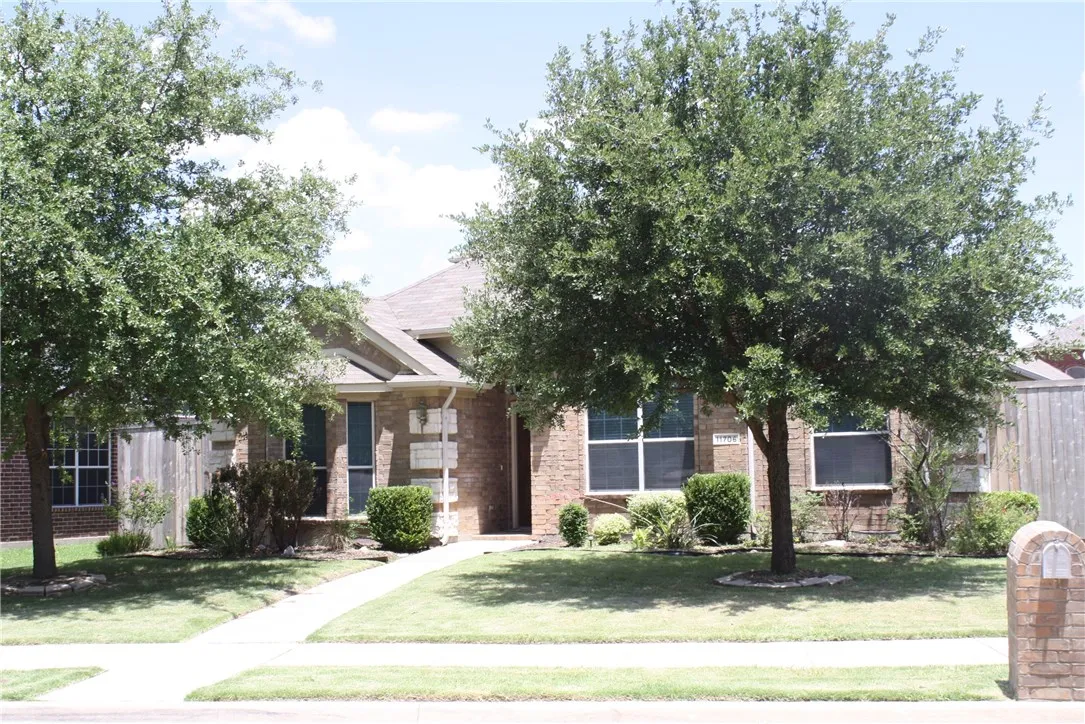 Beautiful updated 1 1/2 story home in Panther Ridge Estates in Frisco. Great area with community pool.