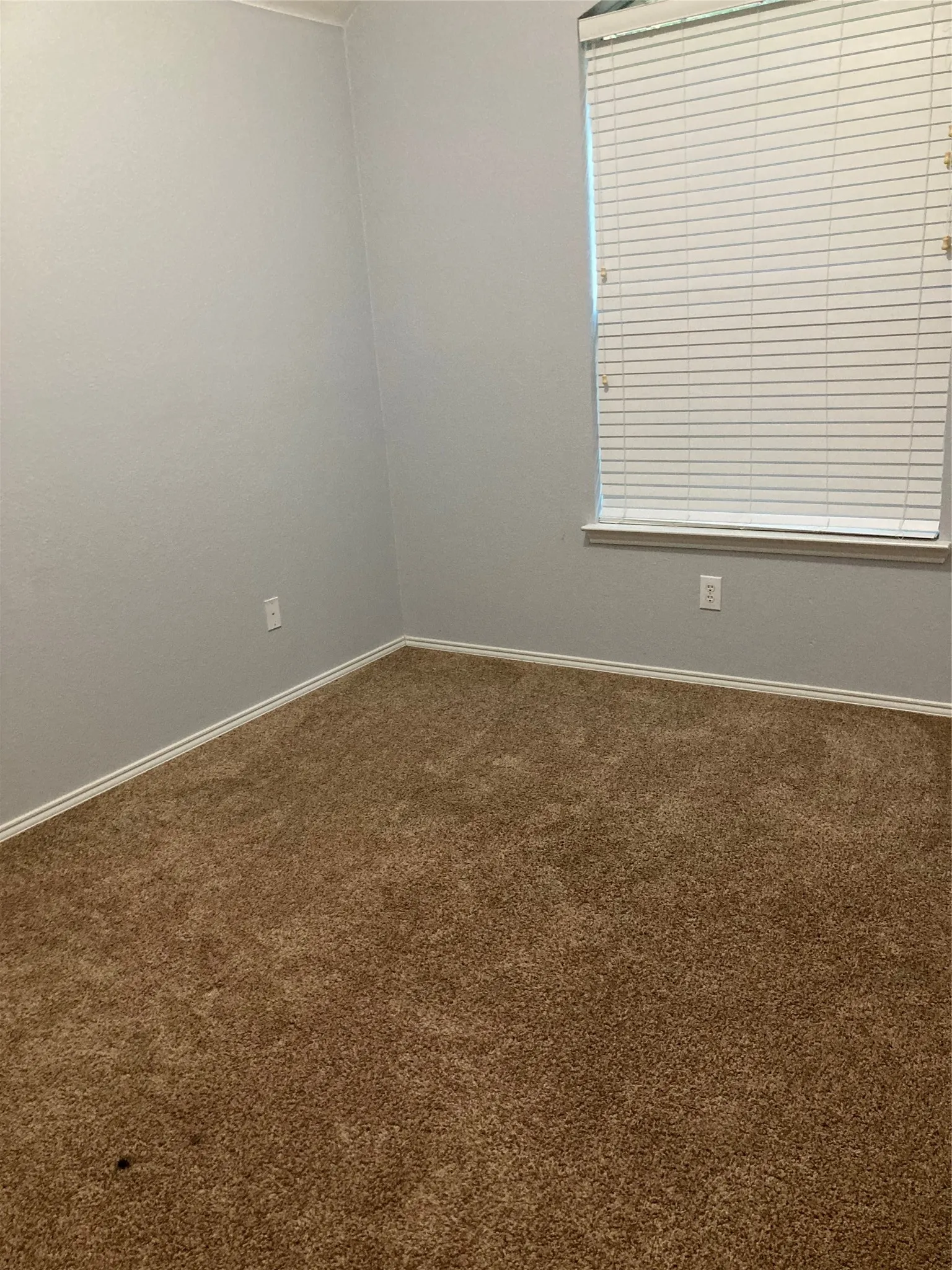 One of the secondary bedrooms.