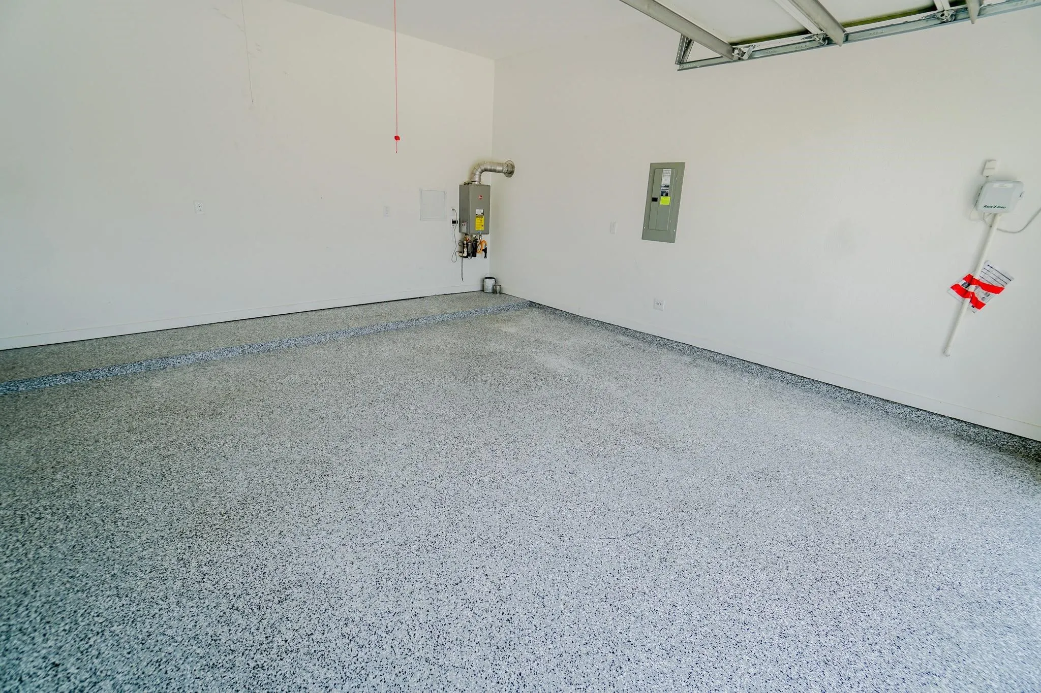 Epoxy-coated concrete flooring with a neutral color palette