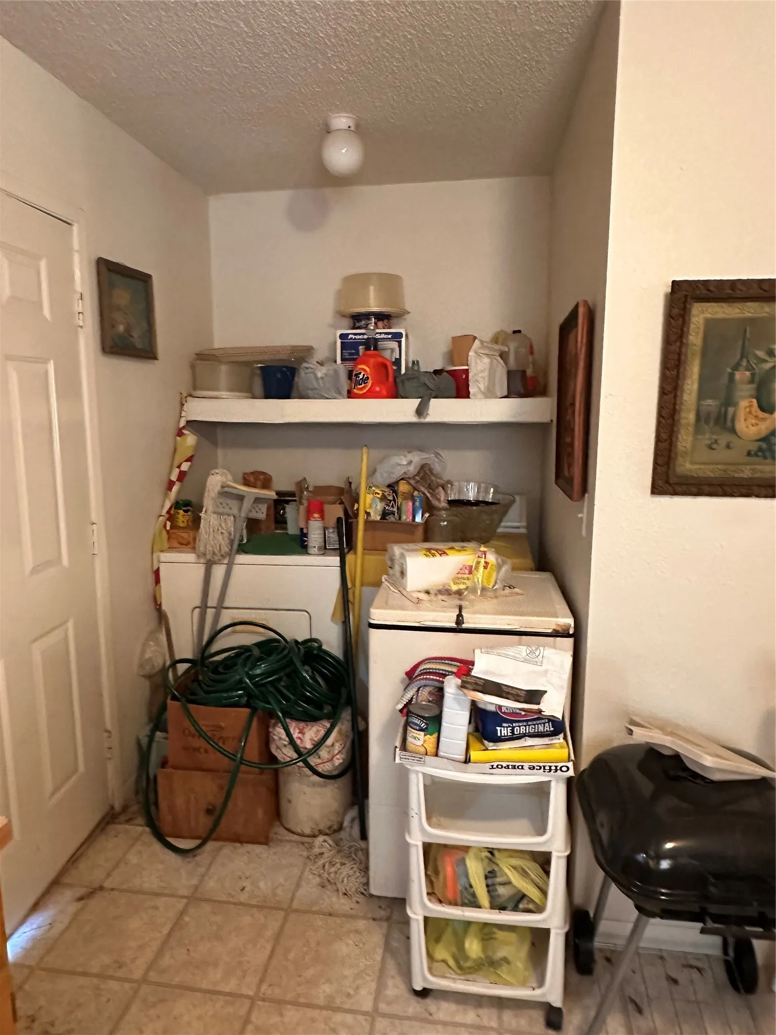 Laundry off Kitchen just inside the Home's back door