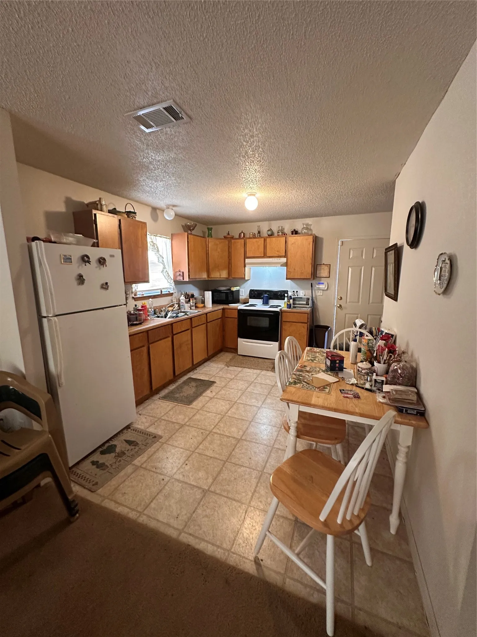 In home - has room for small table and chairs in Kitchen